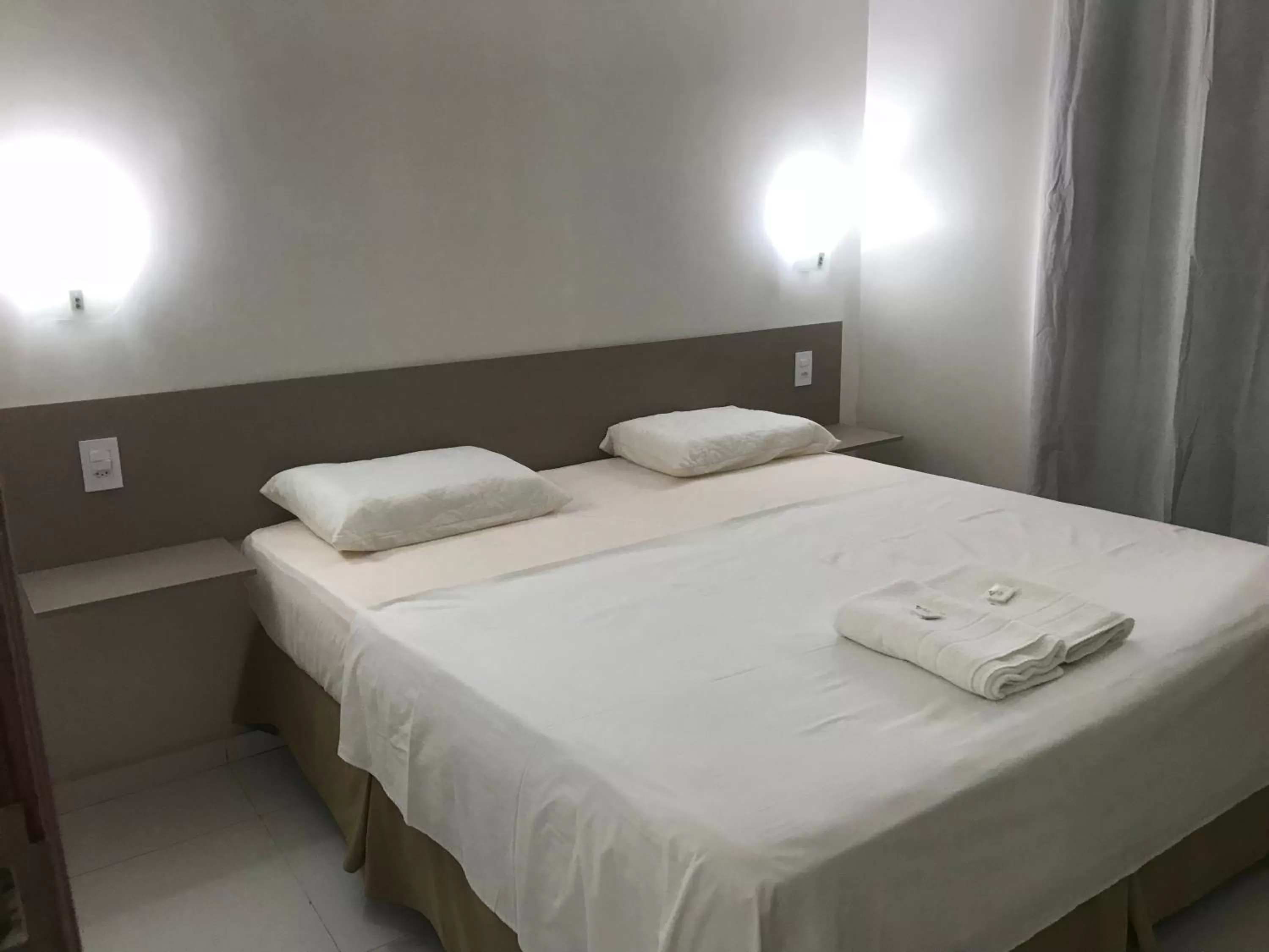 Bed in Pousada Vila do Carmo