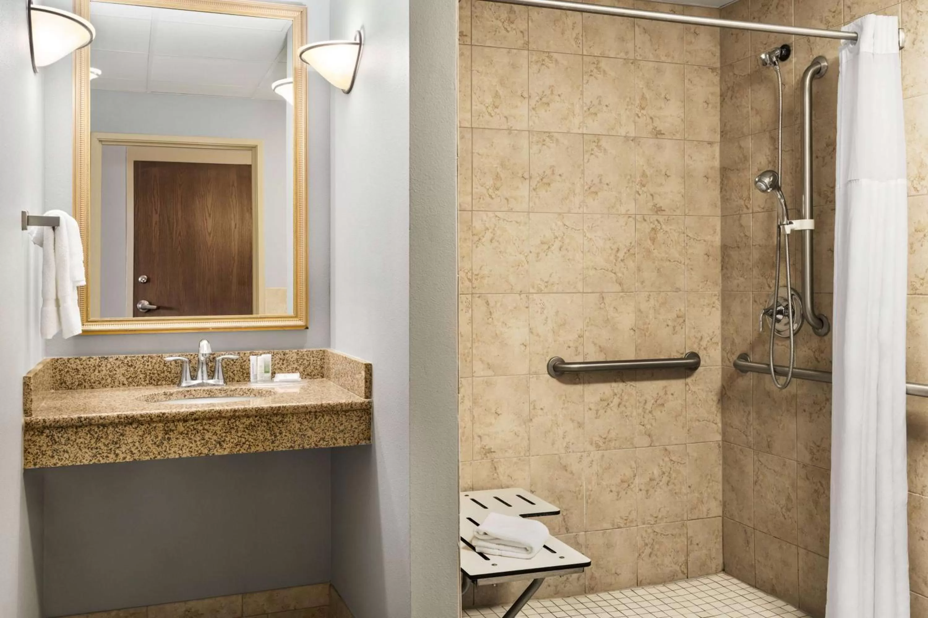 TV and multimedia in AmericInn by Wyndham Laramie Near University of Wyoming