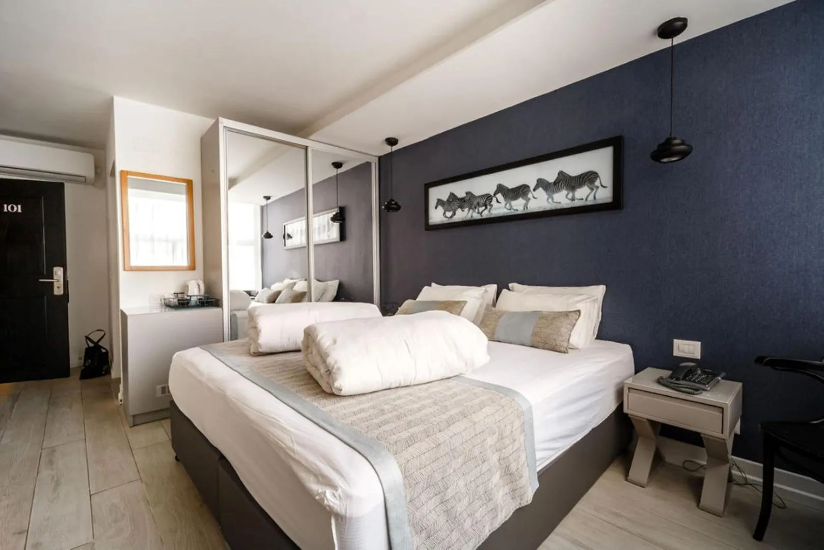 Bed in Kikar Boutique Hotel