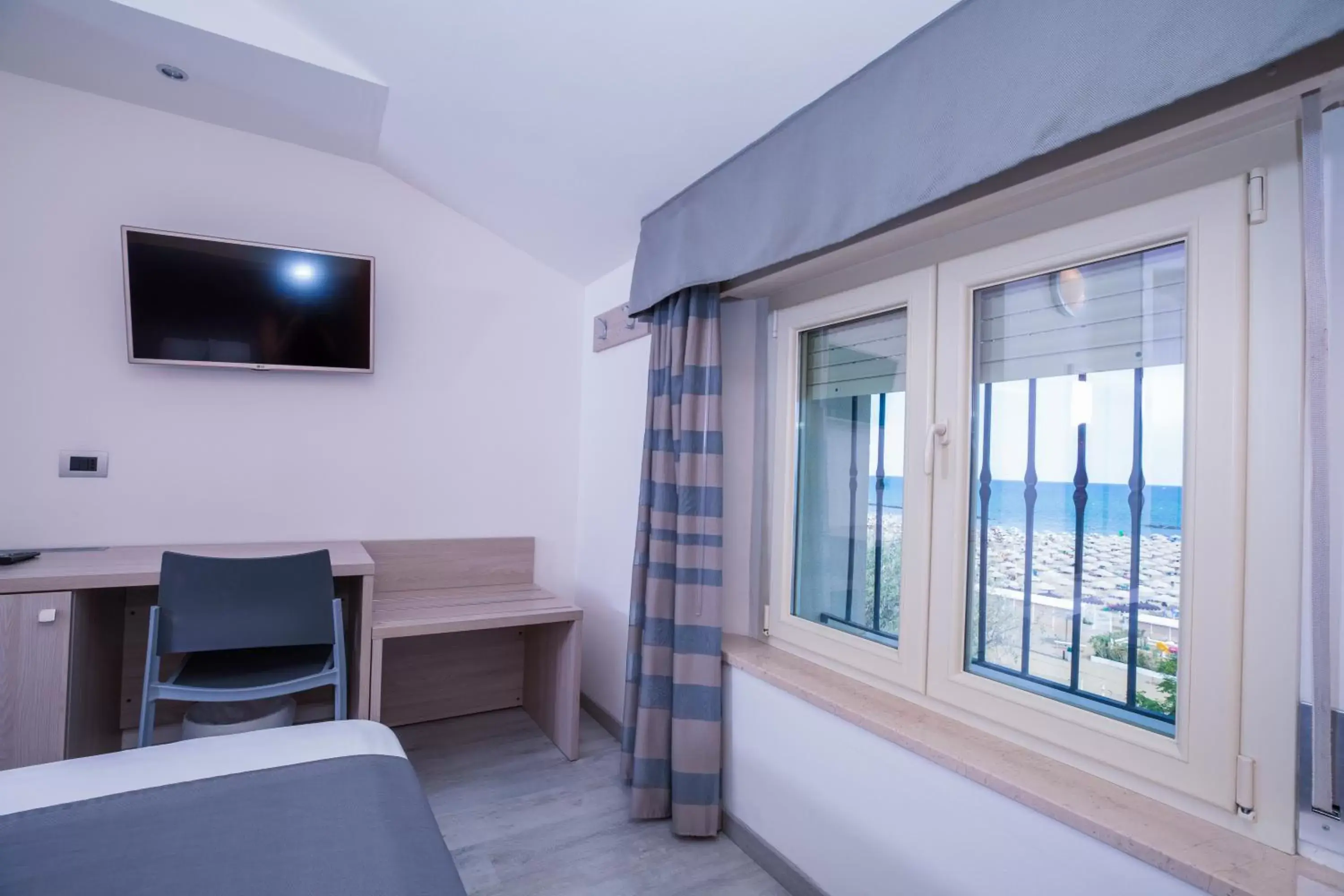 View (from property/room), TV/Entertainment Center in Hotel Gabbiano