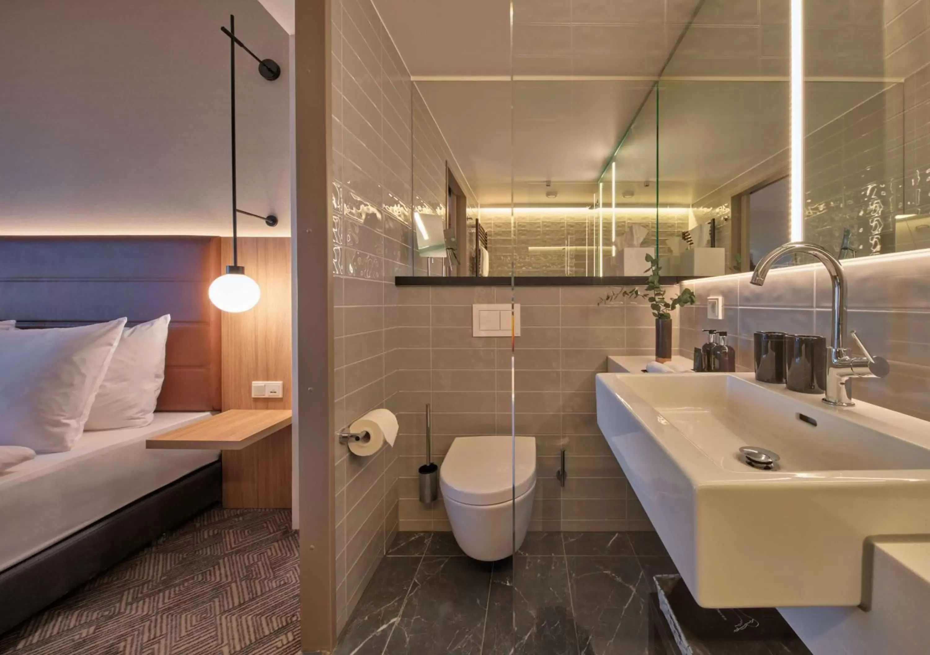 Bathroom in Adina Apartment Hotel Munich Bathroom in Adina Apartment Hotel Munich