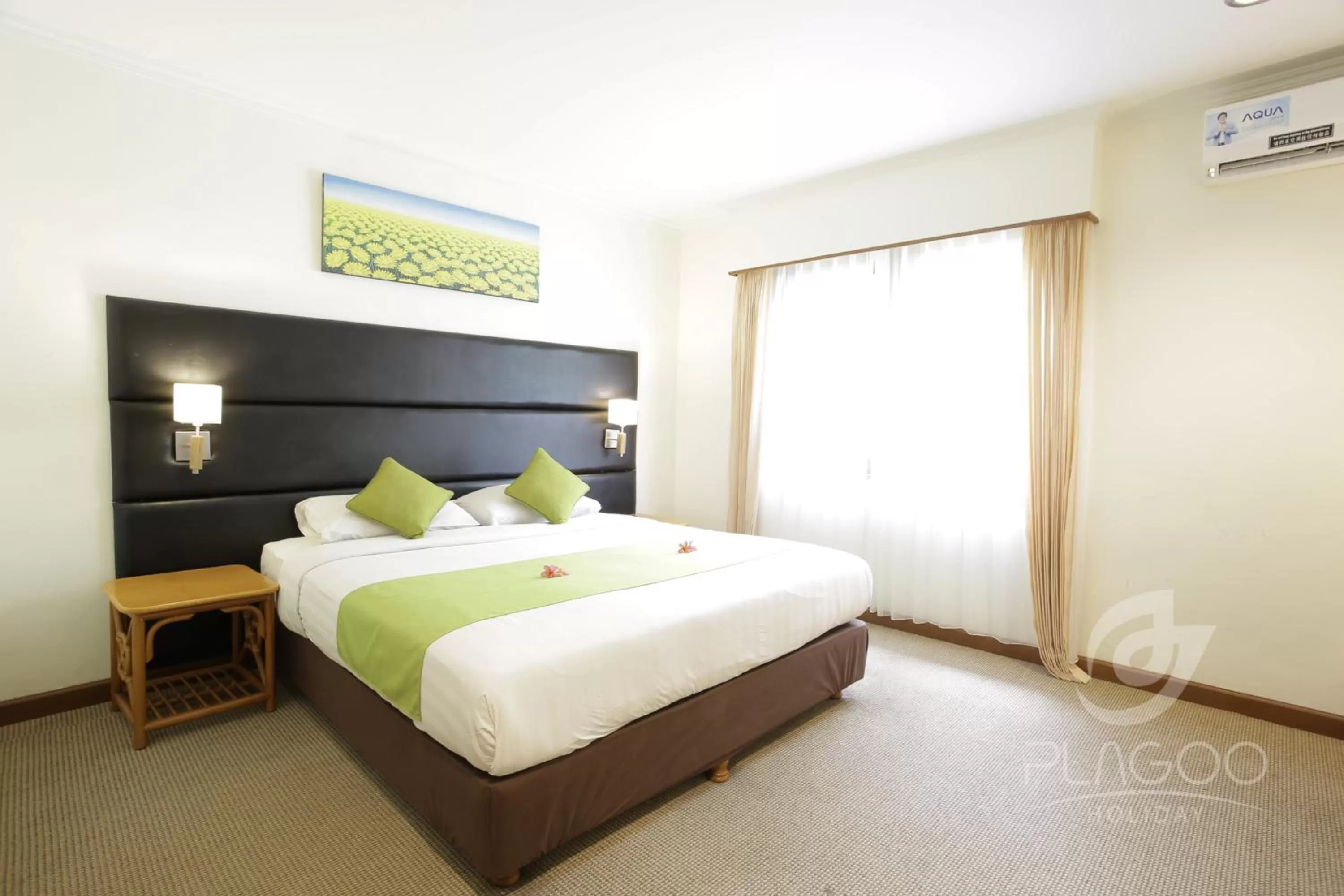 Bed in Plagoo Holiday Hotel