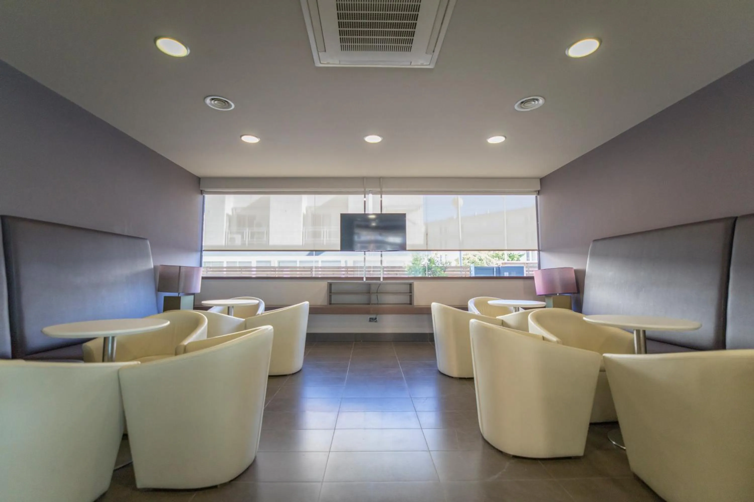 Communal lounge/ TV room in Hotel Augustus