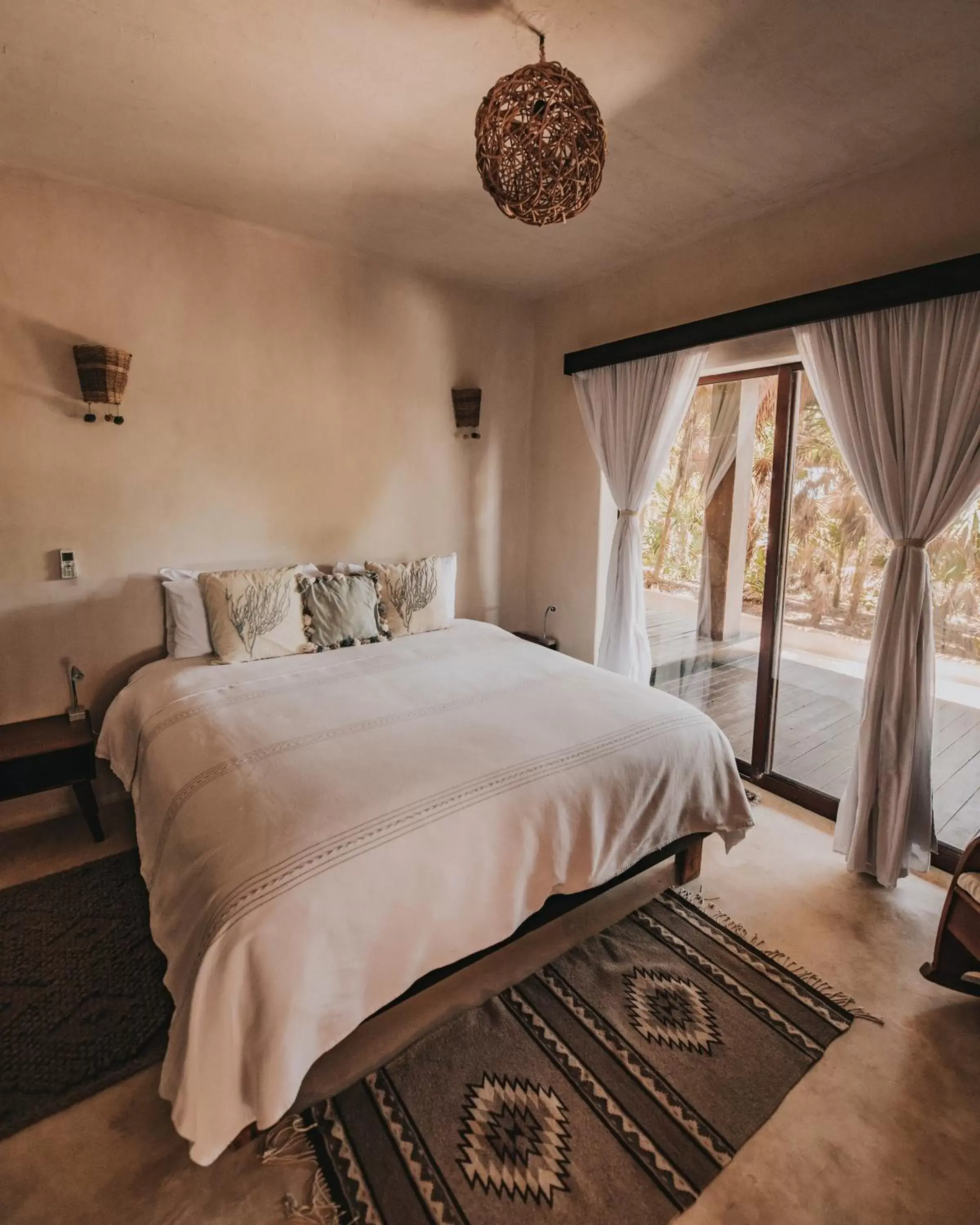 Bed in Papaya Playa Project, Tulum, a Member of Design Hotels Bed in Papaya Playa Project, Tulum, a Member of Design Hotels