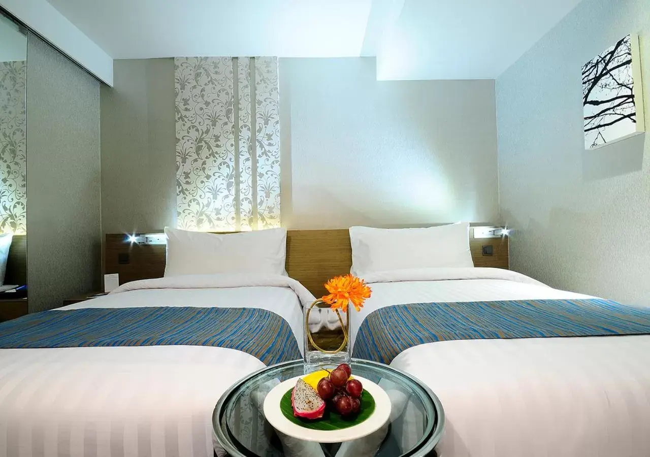 Bed in Citrus Sukhumvit 13 Nana Bangkok by Compass Hospitality