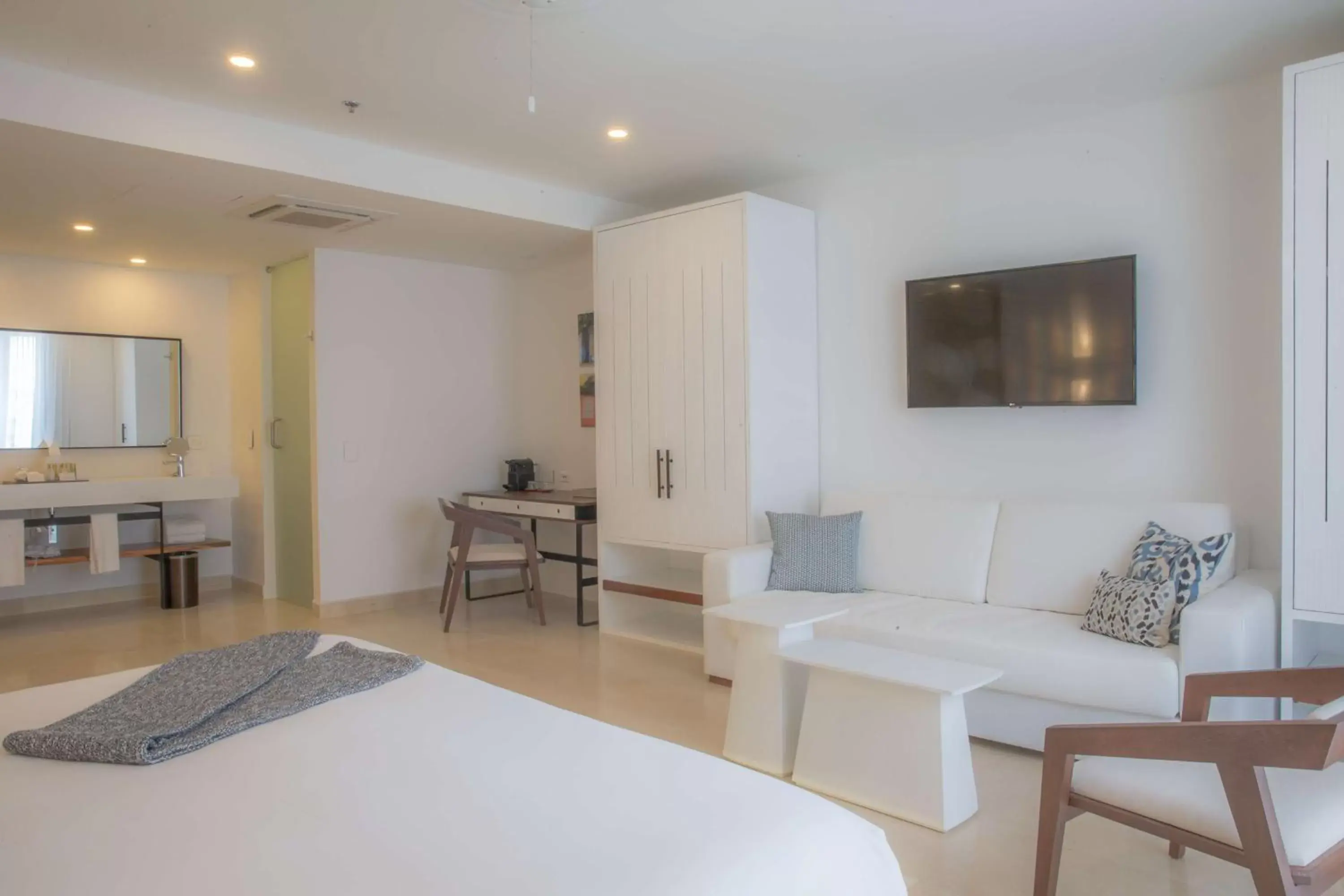 Bedroom, Seating Area in Nacar Hotel Cartagena, Curio Collection by Hilton