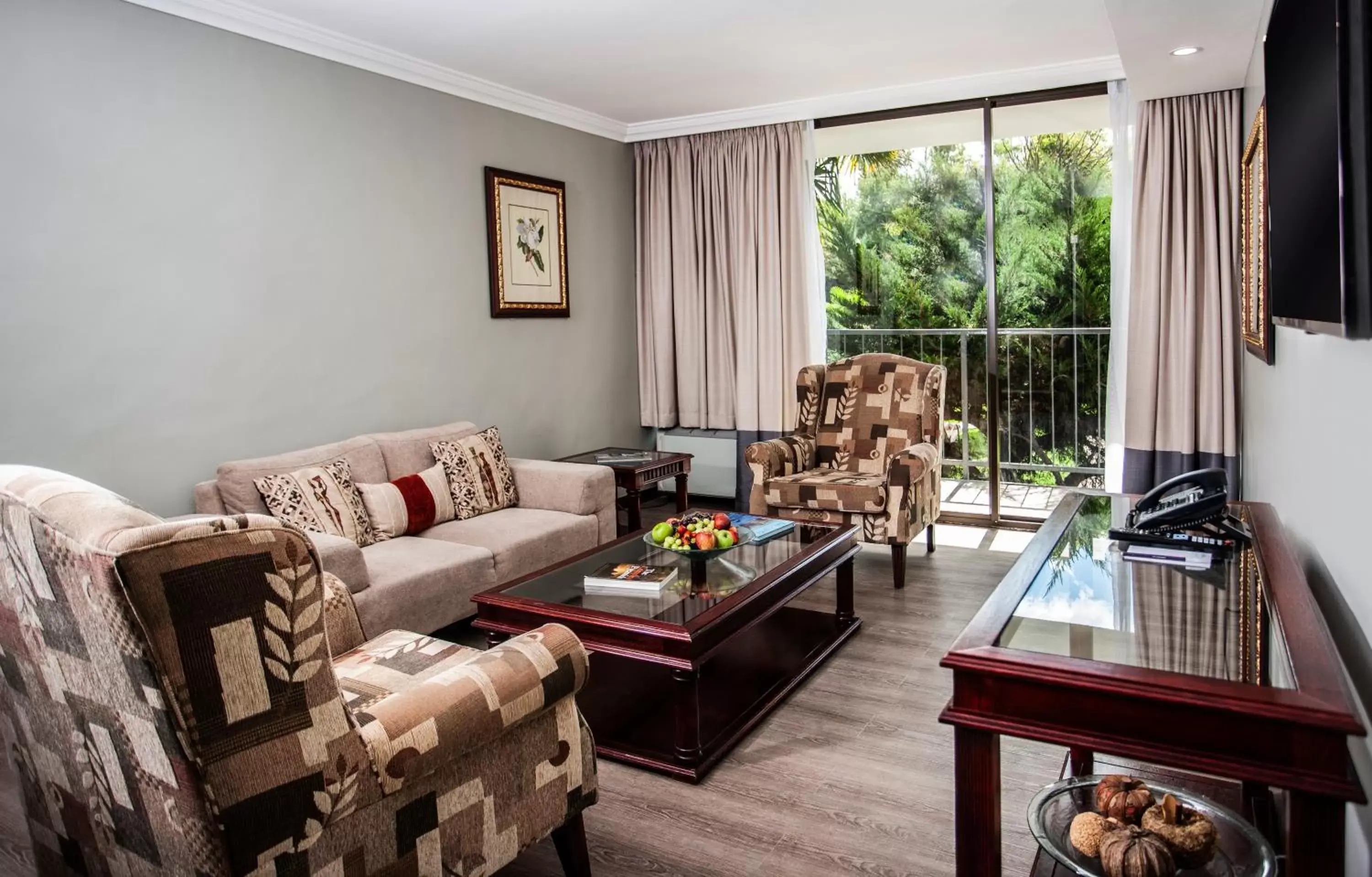 Communal lounge/ TV room in Avani Maseru Hotel Communal lounge/ TV room in Avani Maseru Hotel