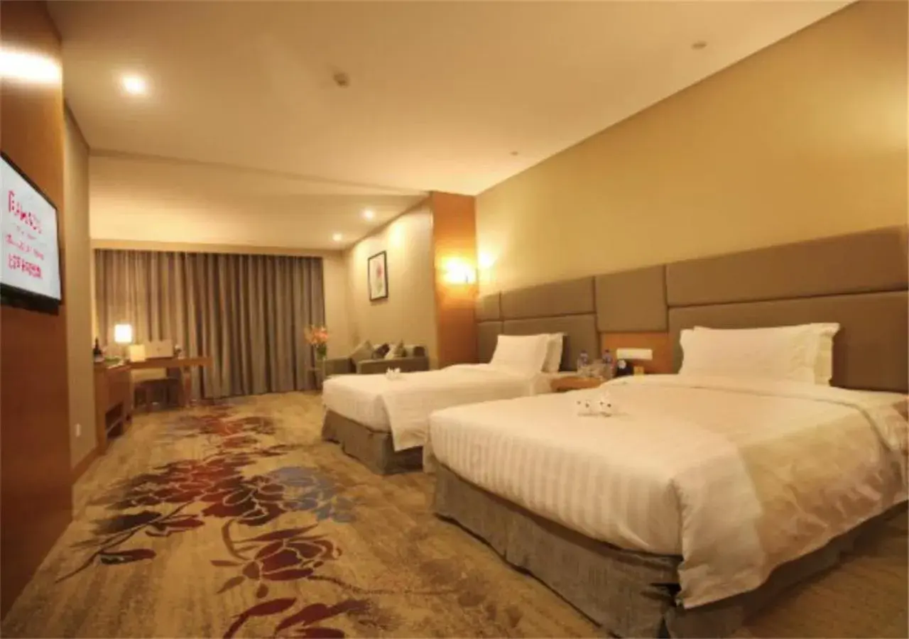 Bed in Ramada by Wyndham Beijing Airport