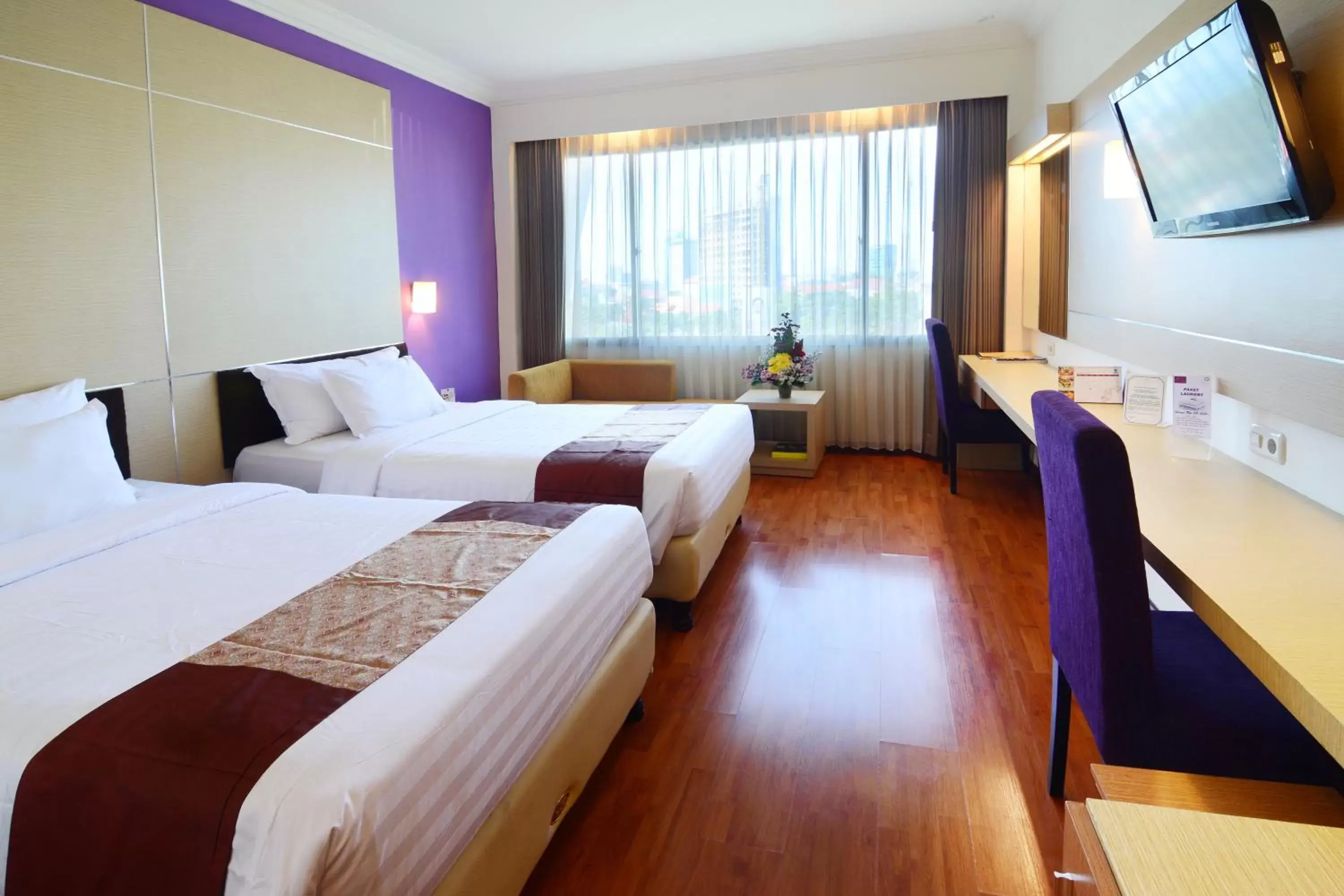 Bed in Grand Inna Tunjungan