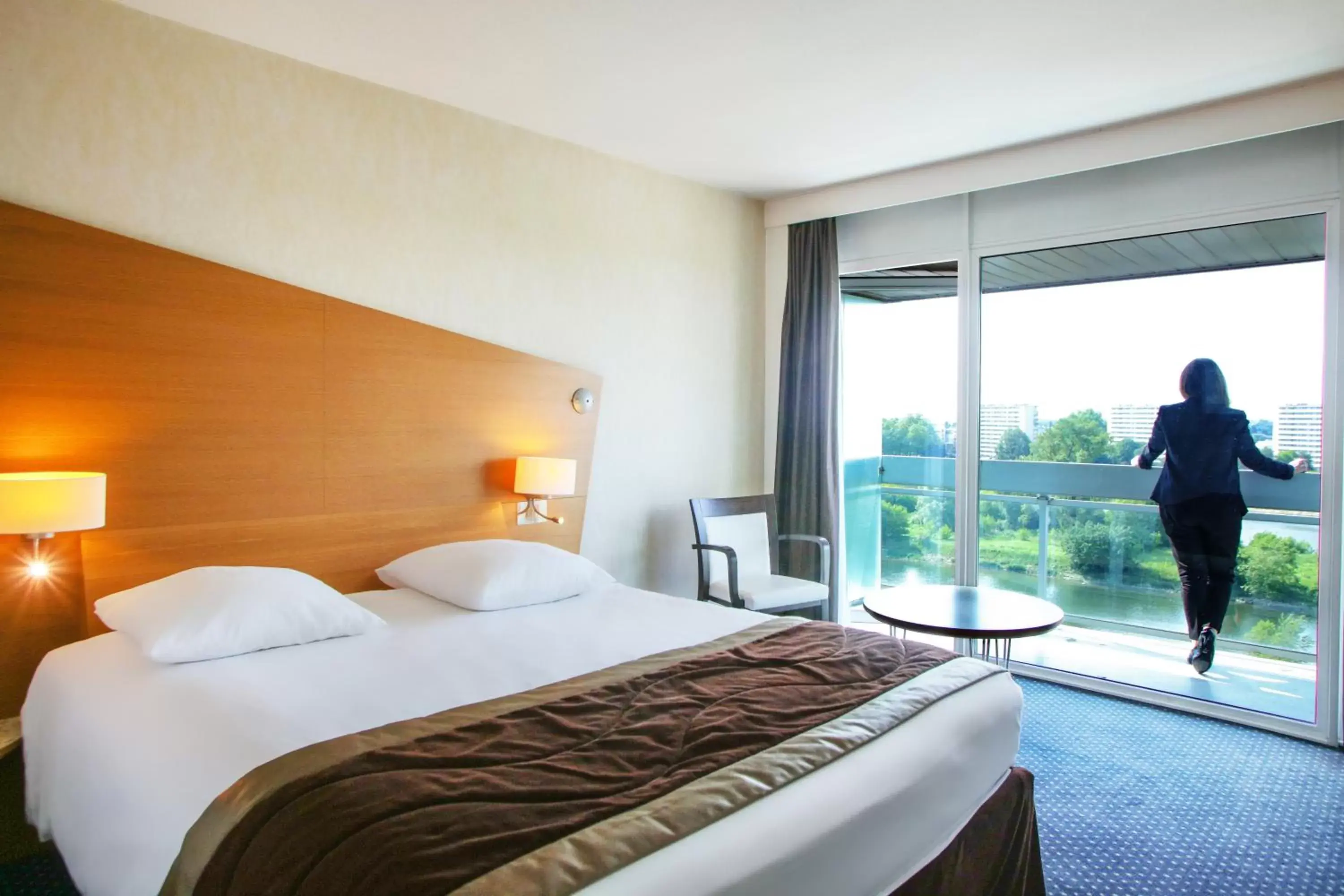 Photo of the whole room, Bed in Mercure Orléans Centre Bords de Loire