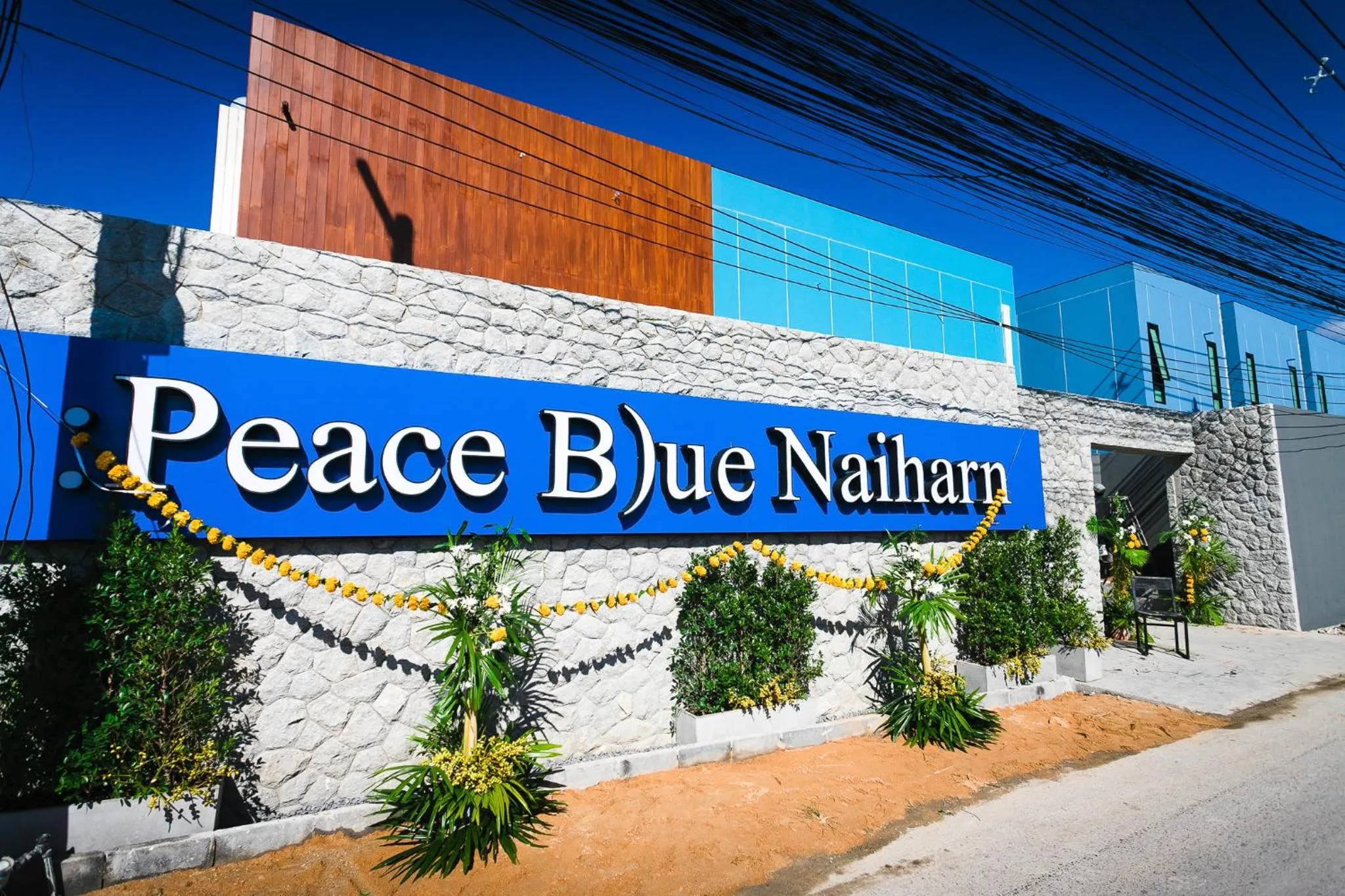 Property building in Peace Blue Naiharn Naturist Resort Phuket SHA Extra Plus