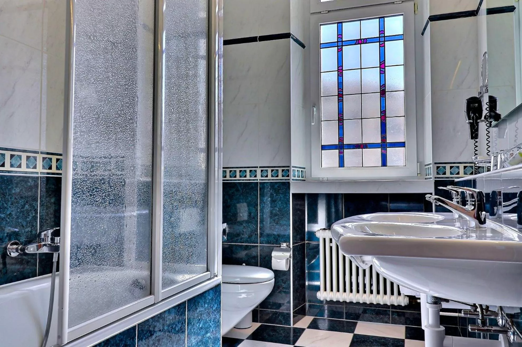 Bathroom in Best Western Plus Hotel Mirabeau