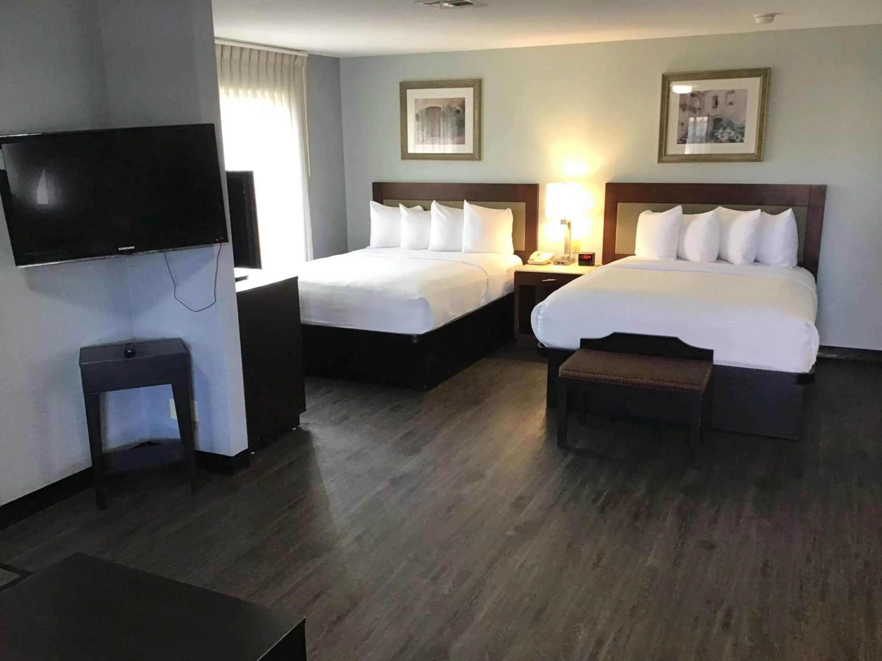 Bed in SureStay Studio by Best Western Pensacola