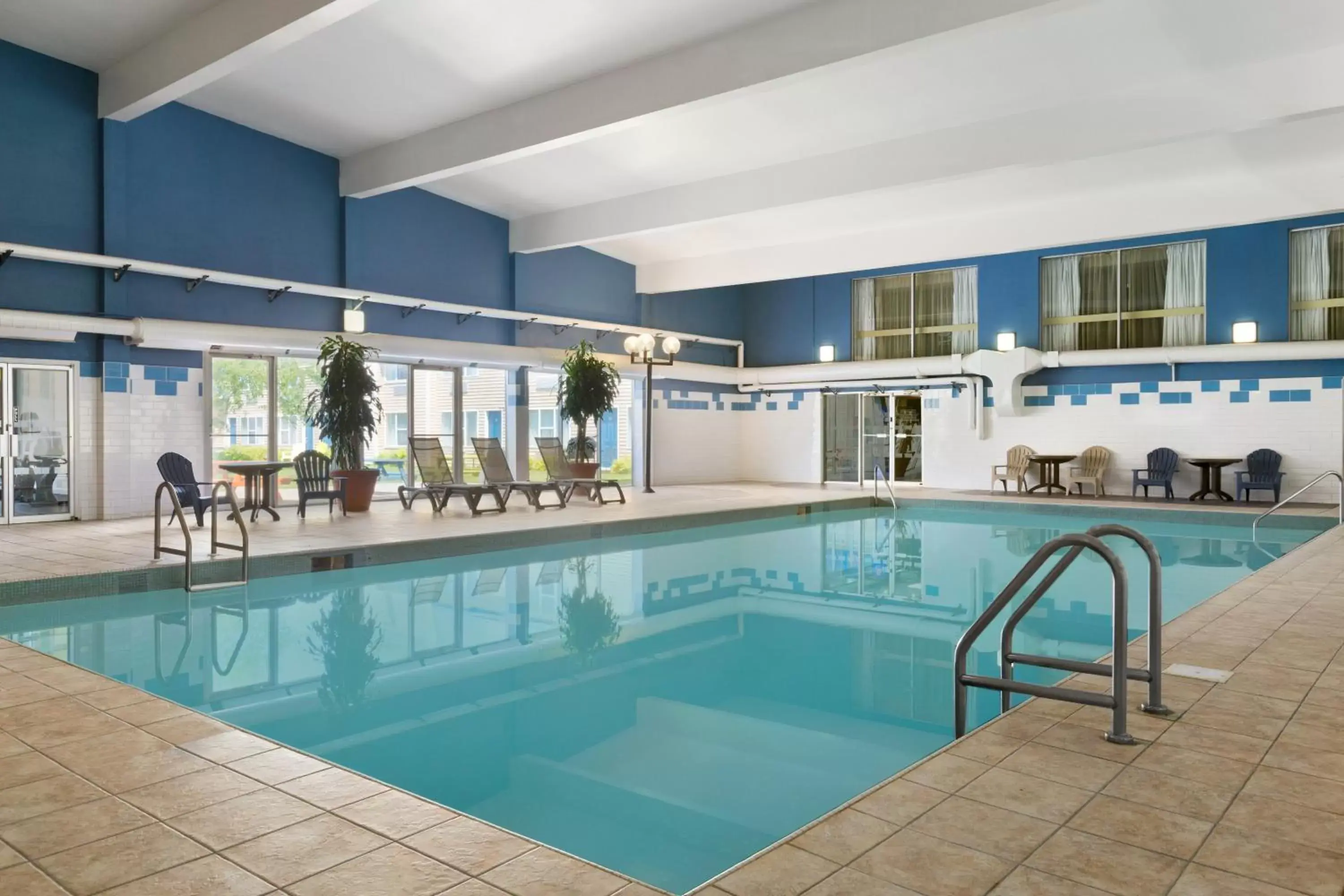 Swimming pool, Property Building in Days Inn & Suites by Wyndham Moncton