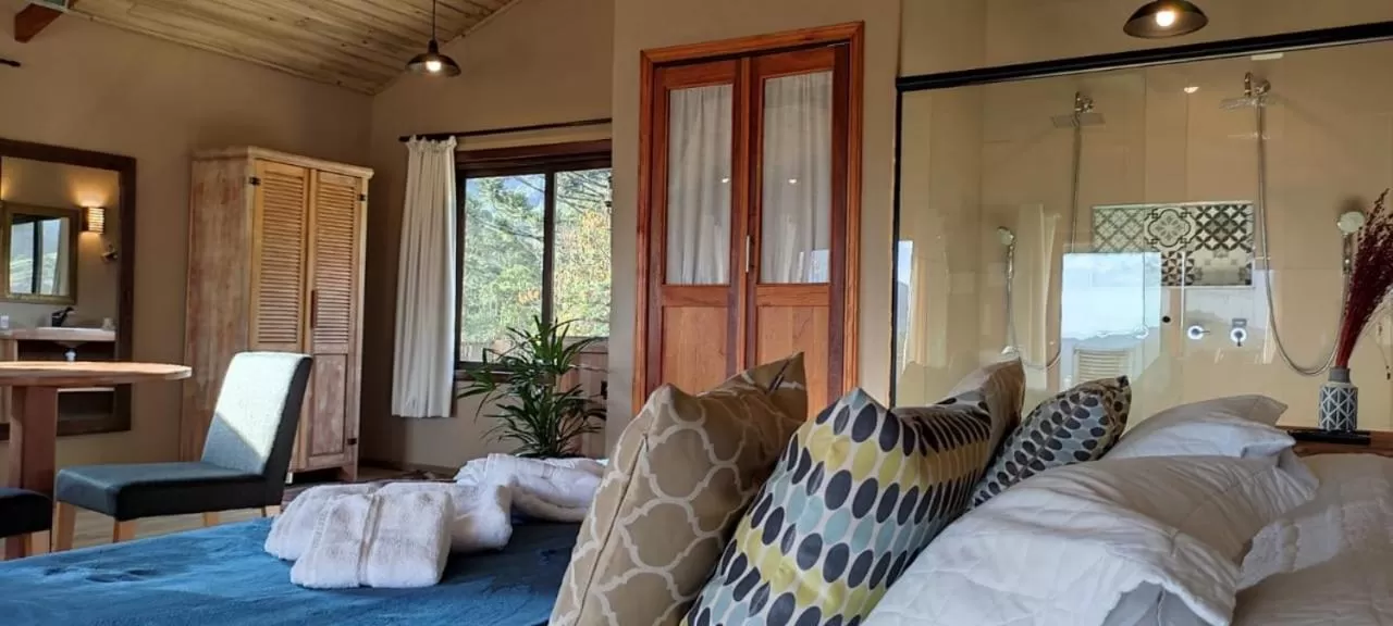 Bed in Pousada Serra do Luar