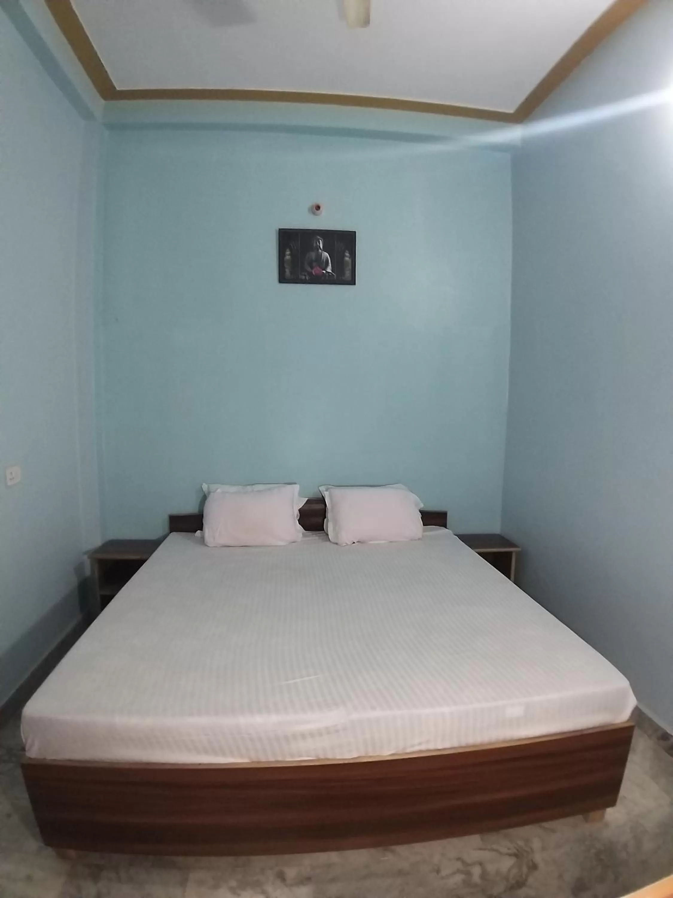 Bed in Mahamaya Paying Guest House