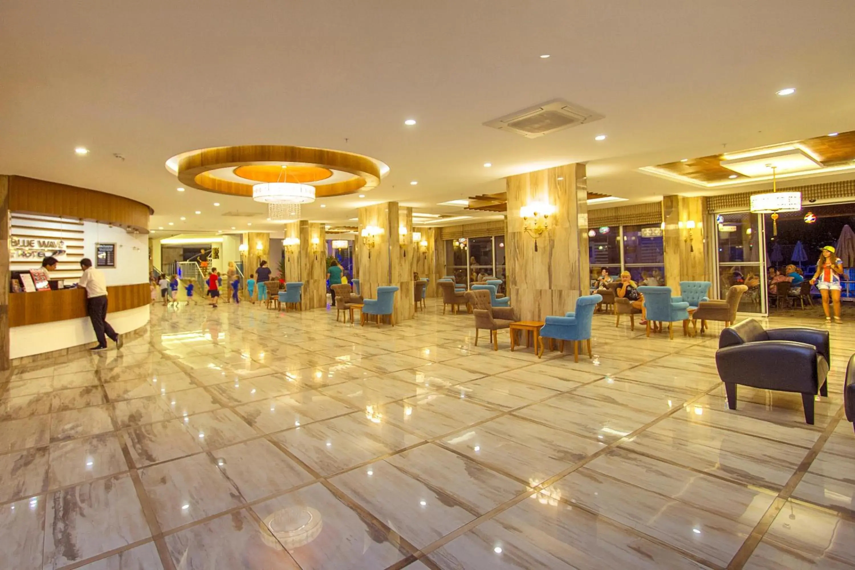 Lobby or reception in Blue Wave Suite Hotel