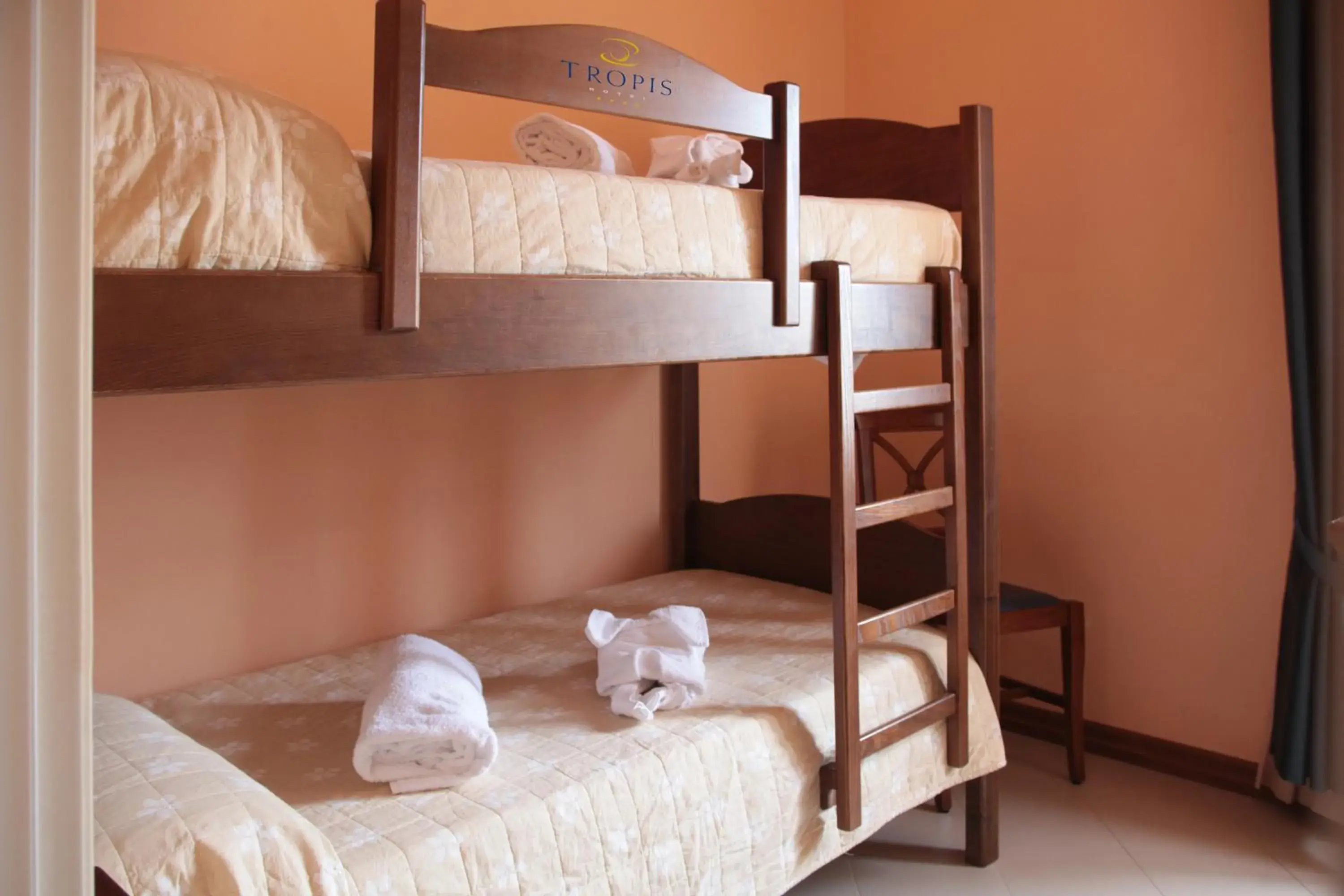 Bed, Bunk Bed in Hotel Tropis