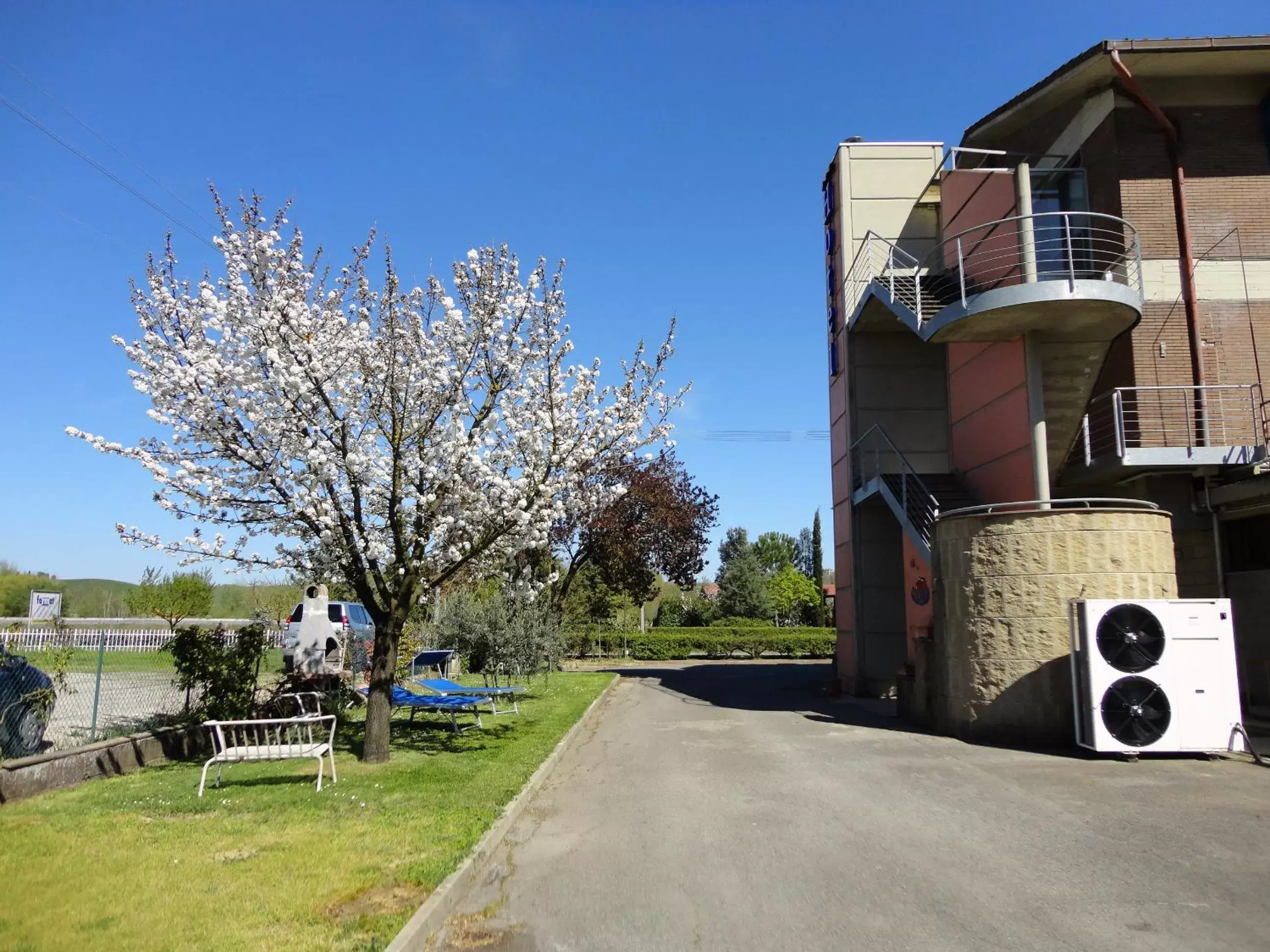 Facade/entrance, Property Building in 1000 Miglia