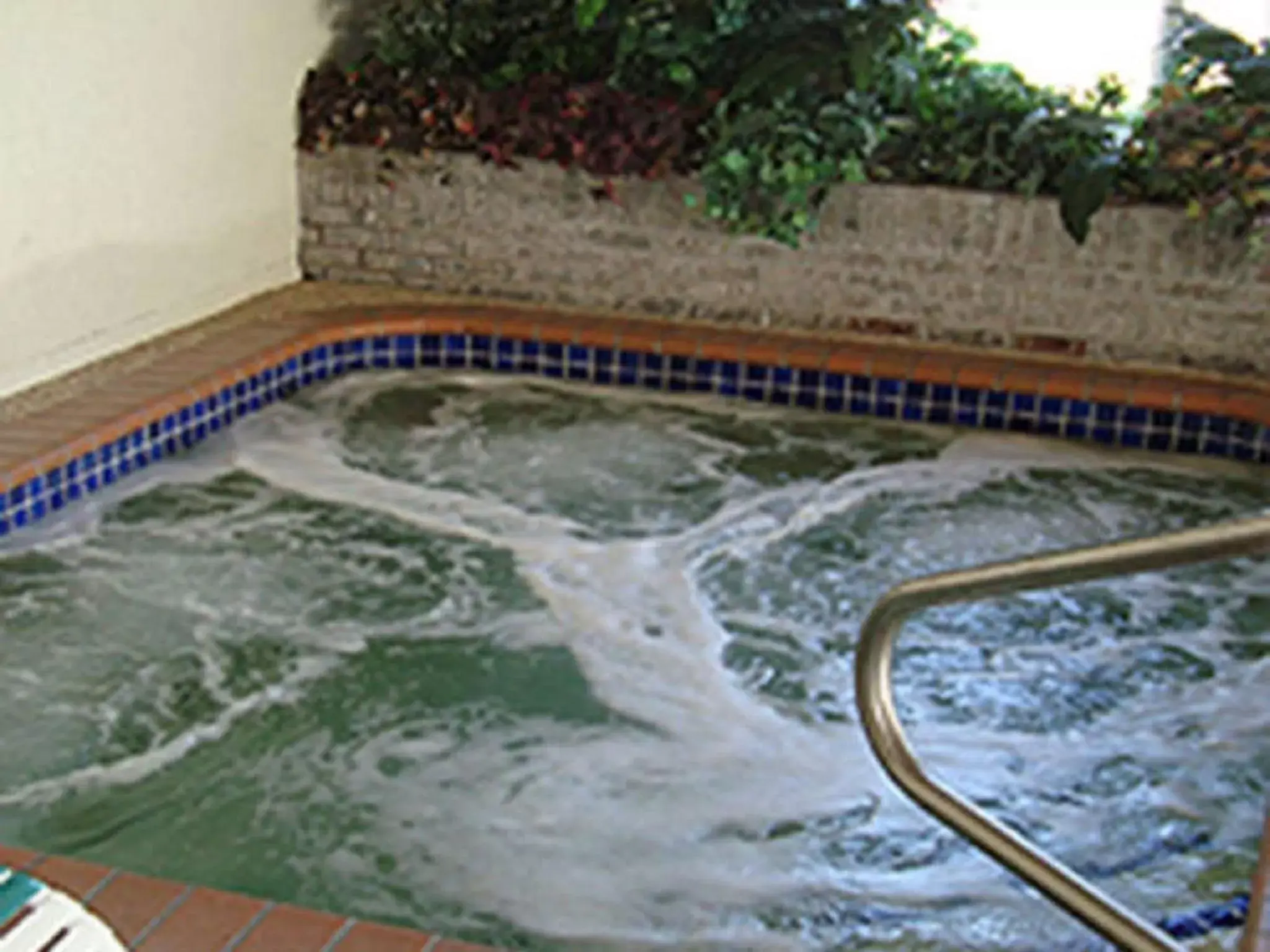 Hot Tub, Swimming Pool in GrandStay Hotel and Suite Waseca