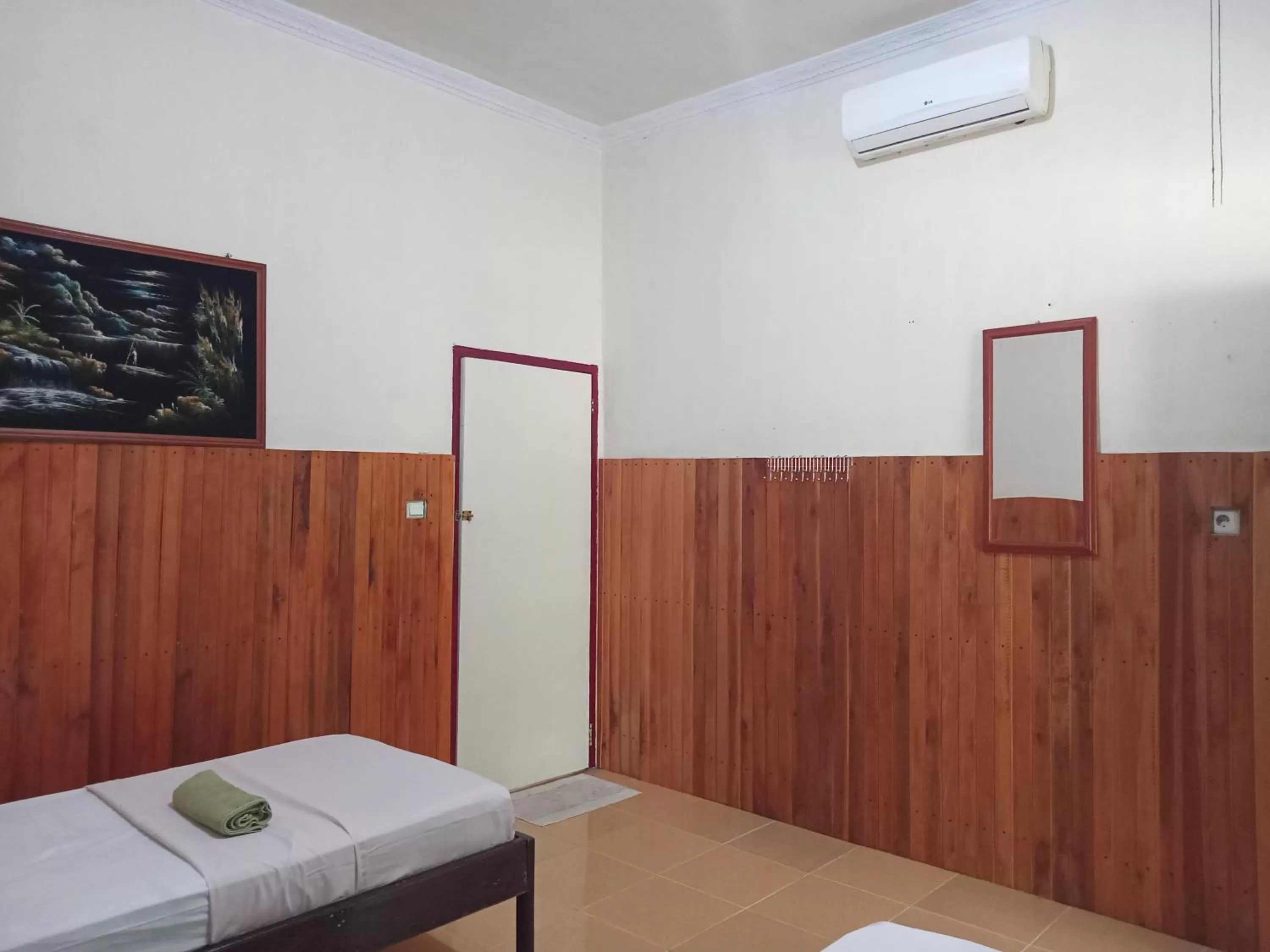 Bed in Tangkoko Lodge