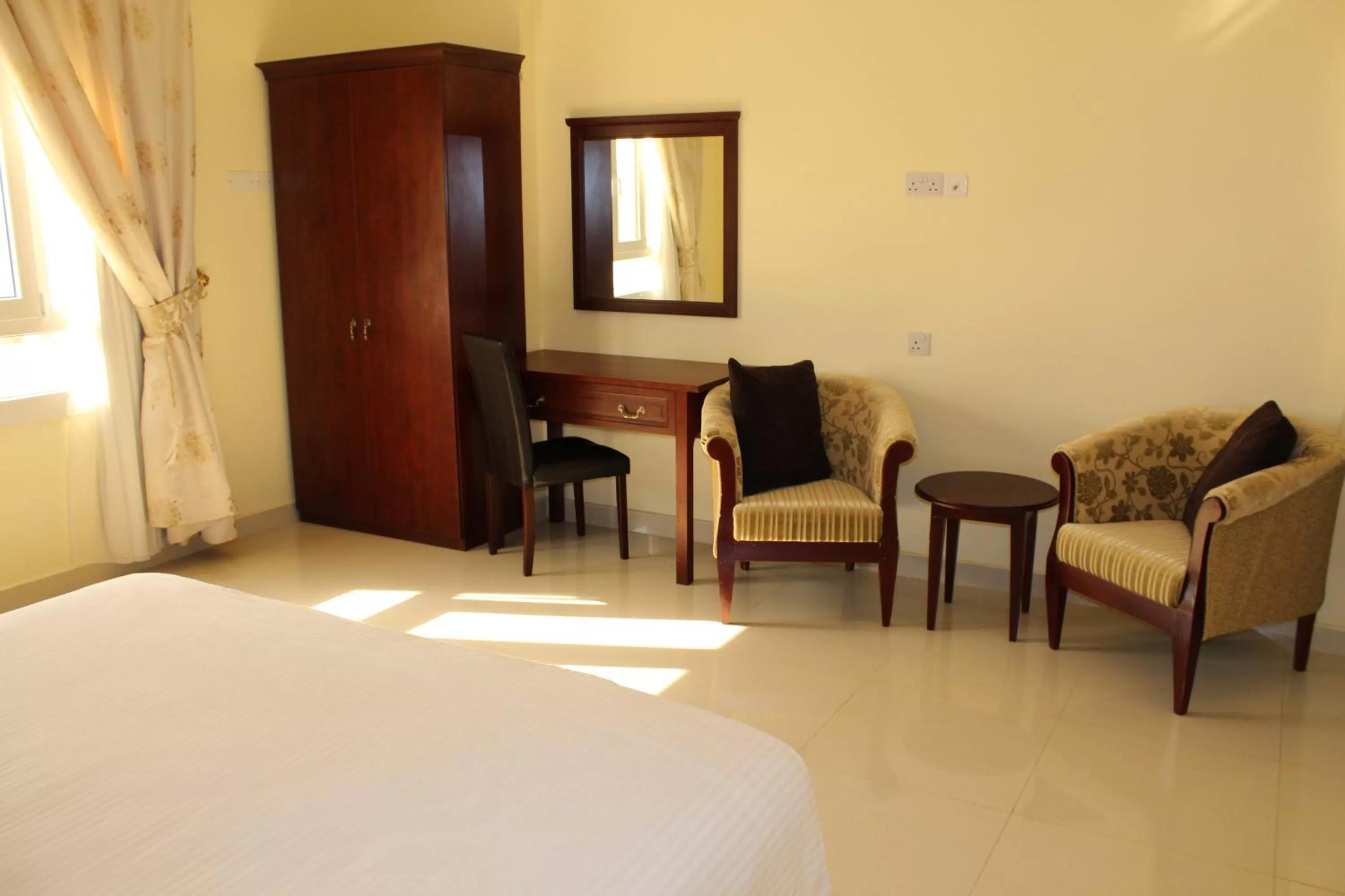 Day, Bed in Nizwa Hotel Apartments
