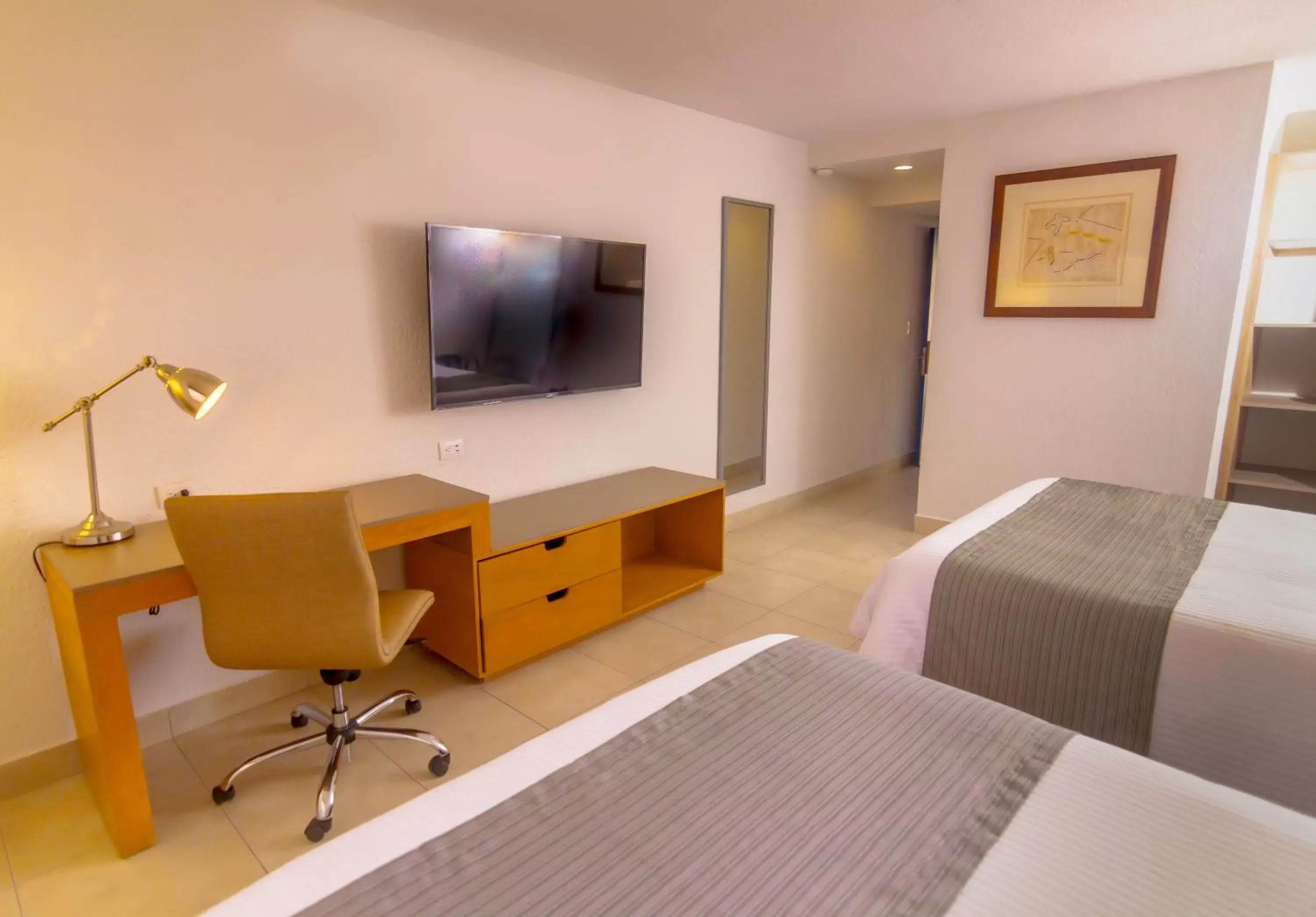 Bedroom, TV/Entertainment Center in Gamma Guaymas Armida Hotel