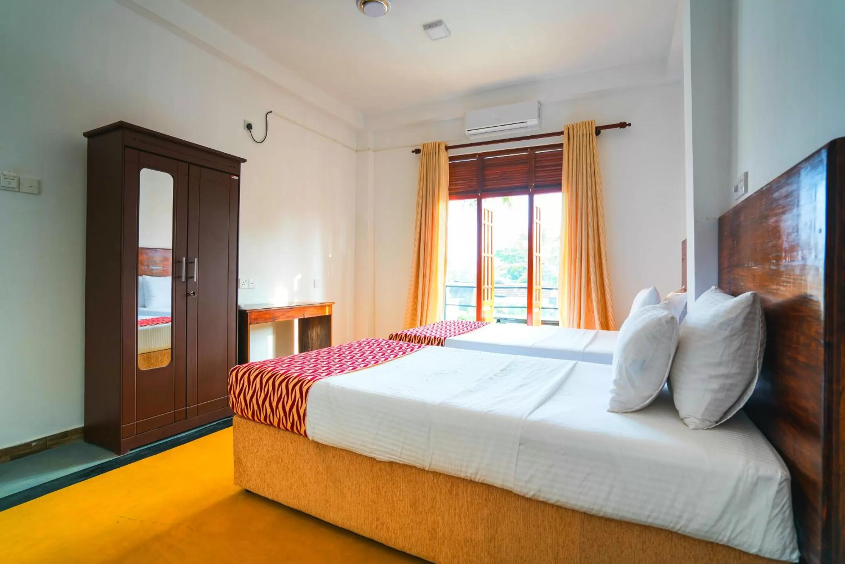 Bed in Ocean Bay Surf Resort Weligama