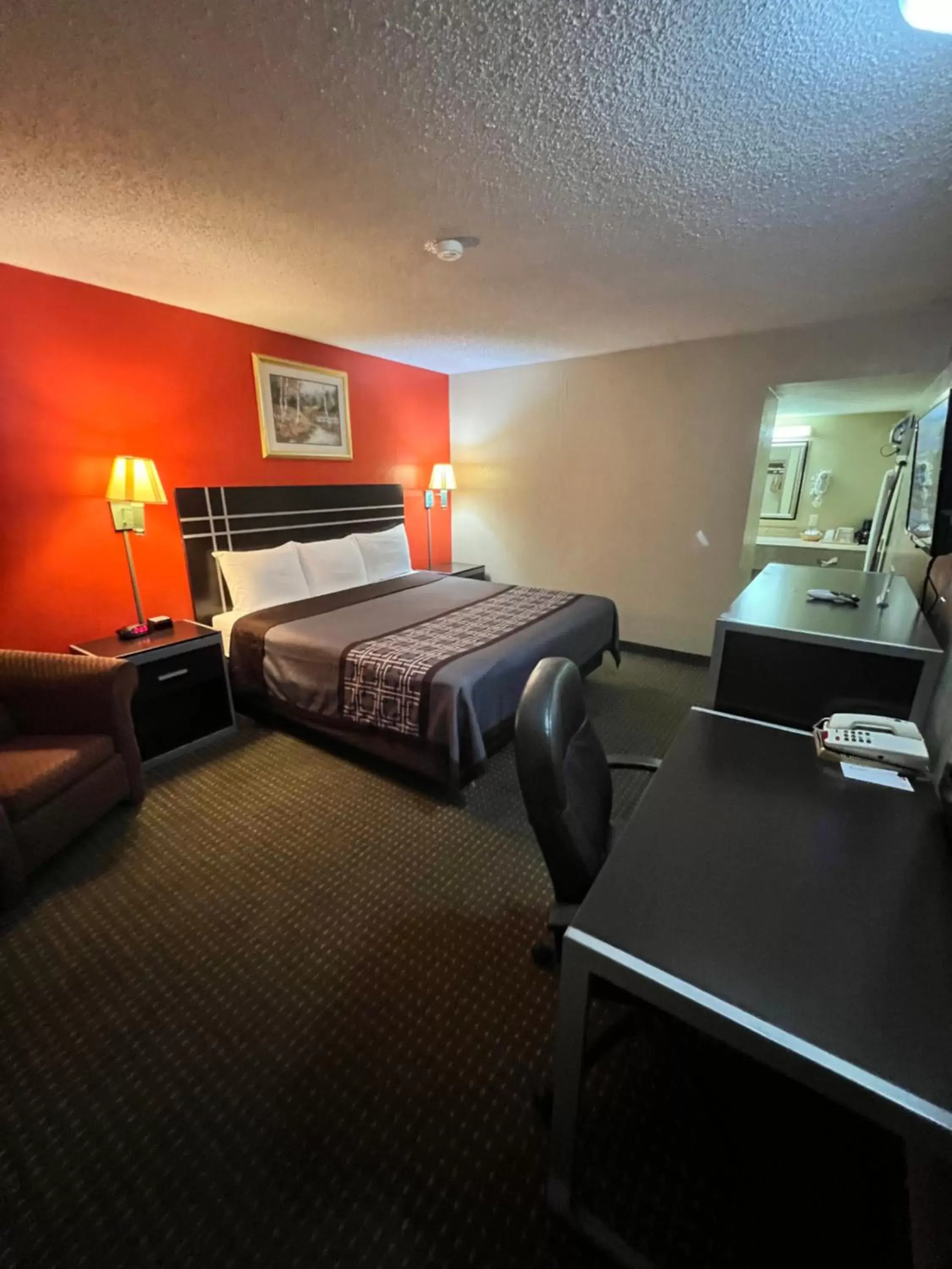 Bed in Continental Inn and Suites