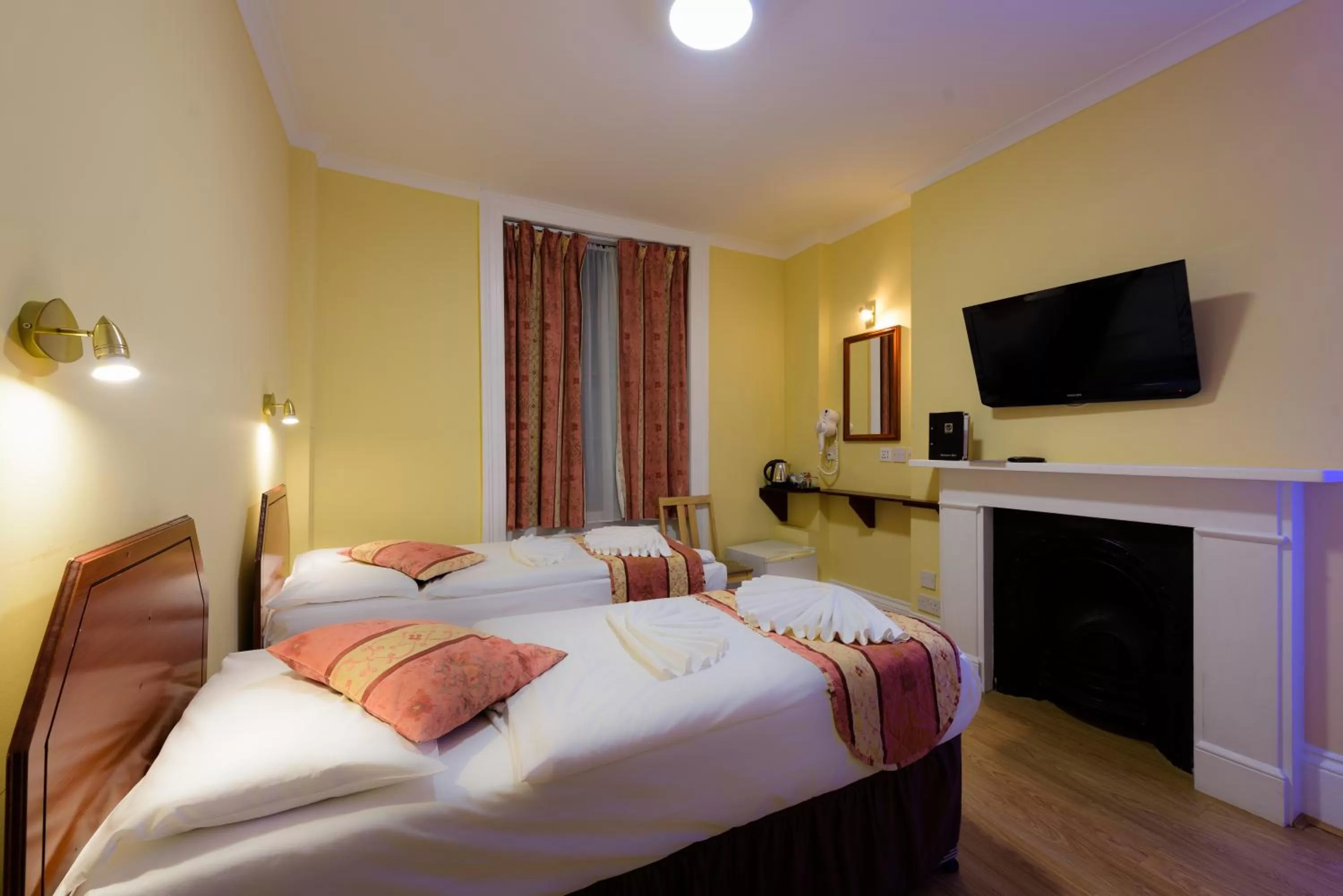 Bed in Shakespeare Hotel