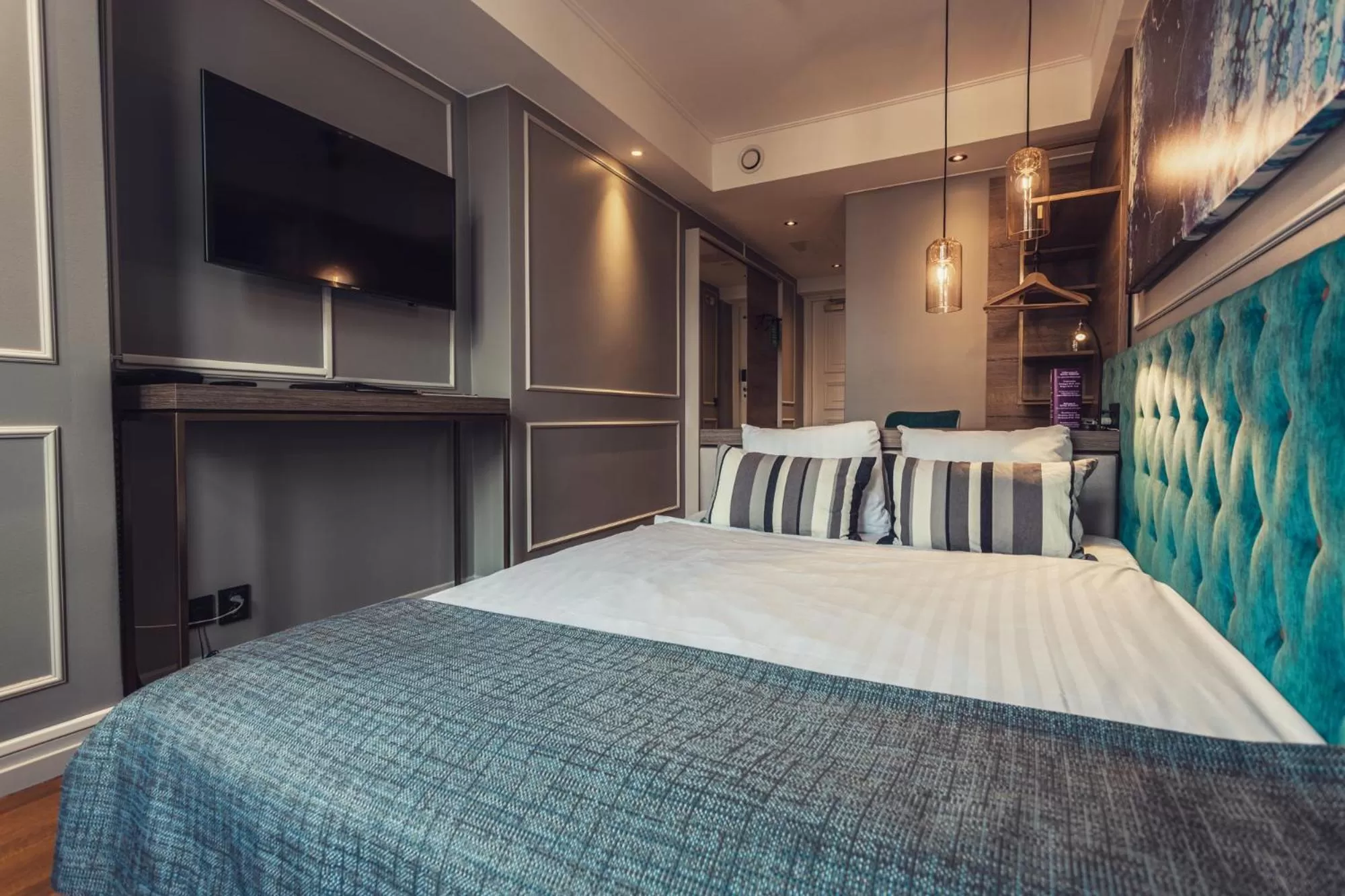 Bed in Hotel Poseidon