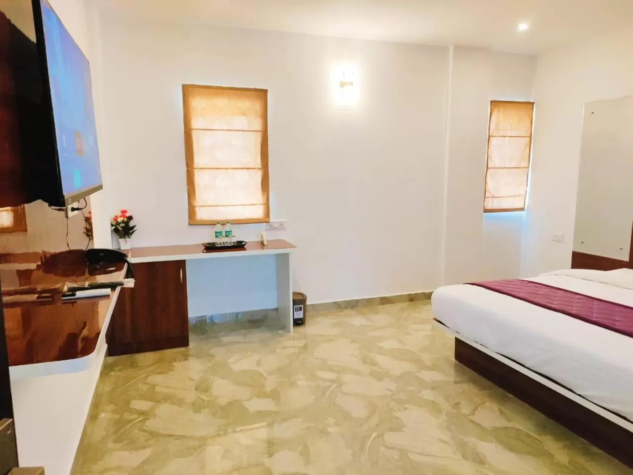 Bedroom, Kitchen/Kitchenette in Keerthis Royal Suites - Hotel Near Kempegowda International Airport