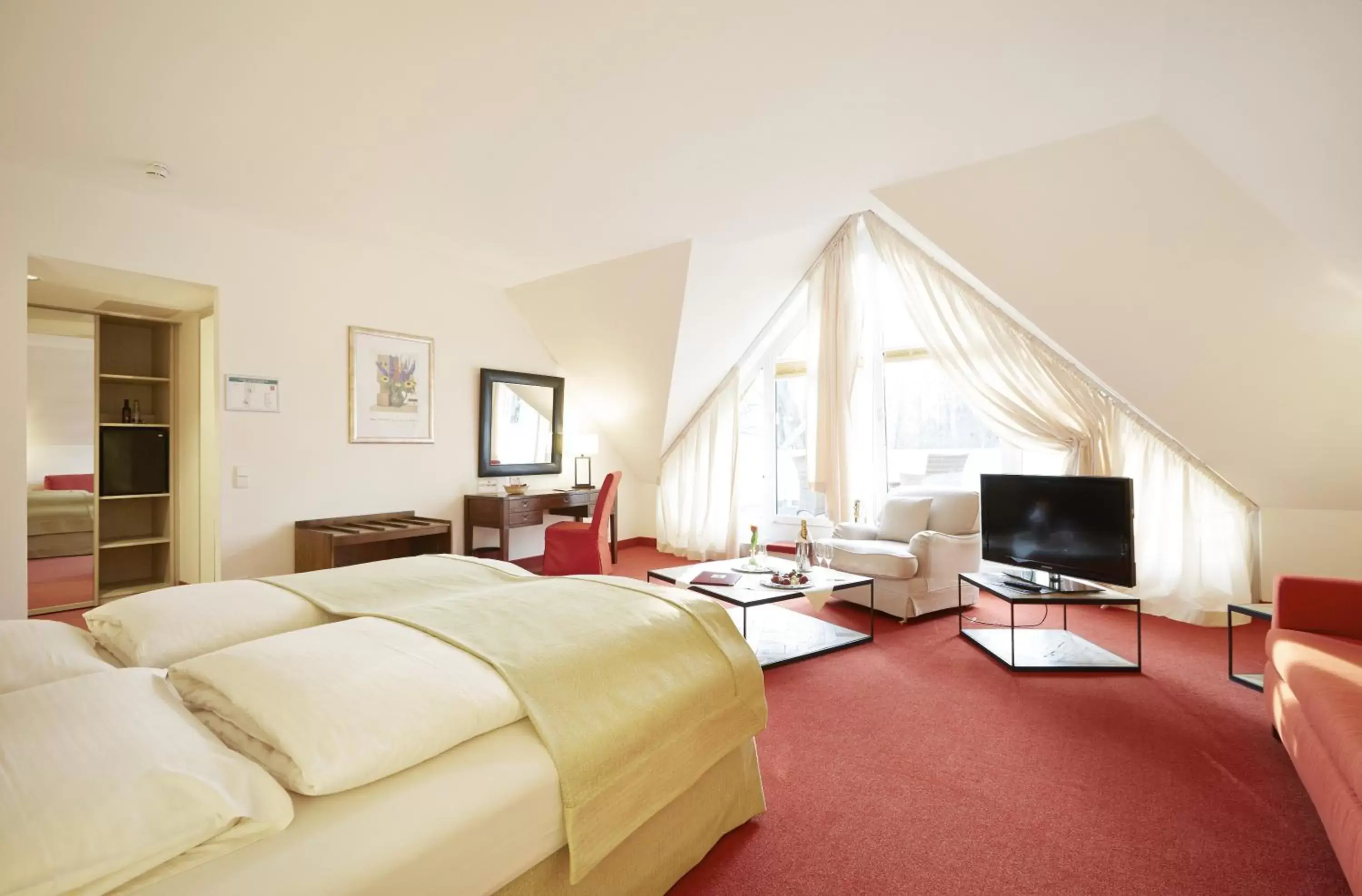 Bed, TV/Entertainment Center in Parkhotel Rothof
