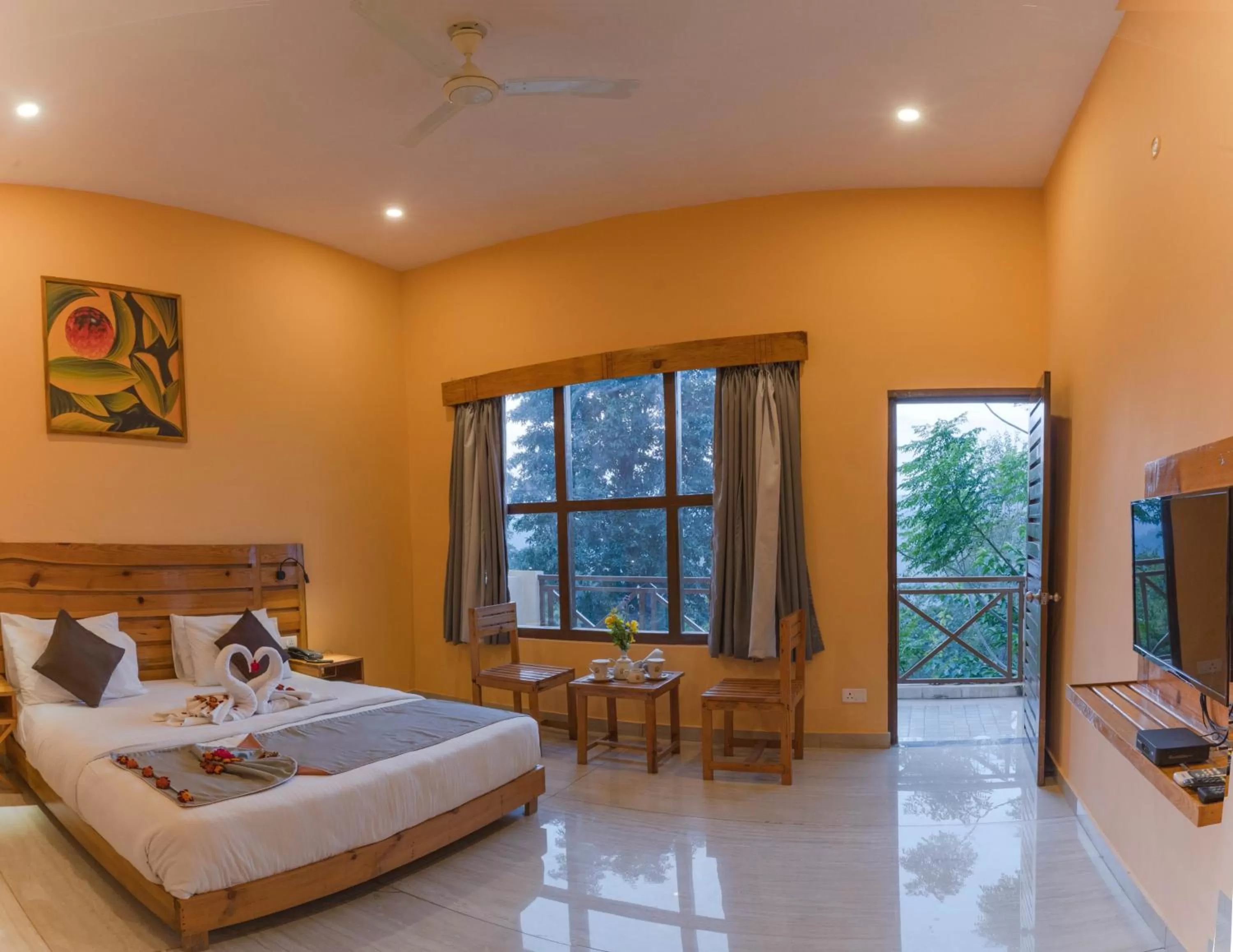 Communal lounge/ TV room, Bed in LaHermitage Resort