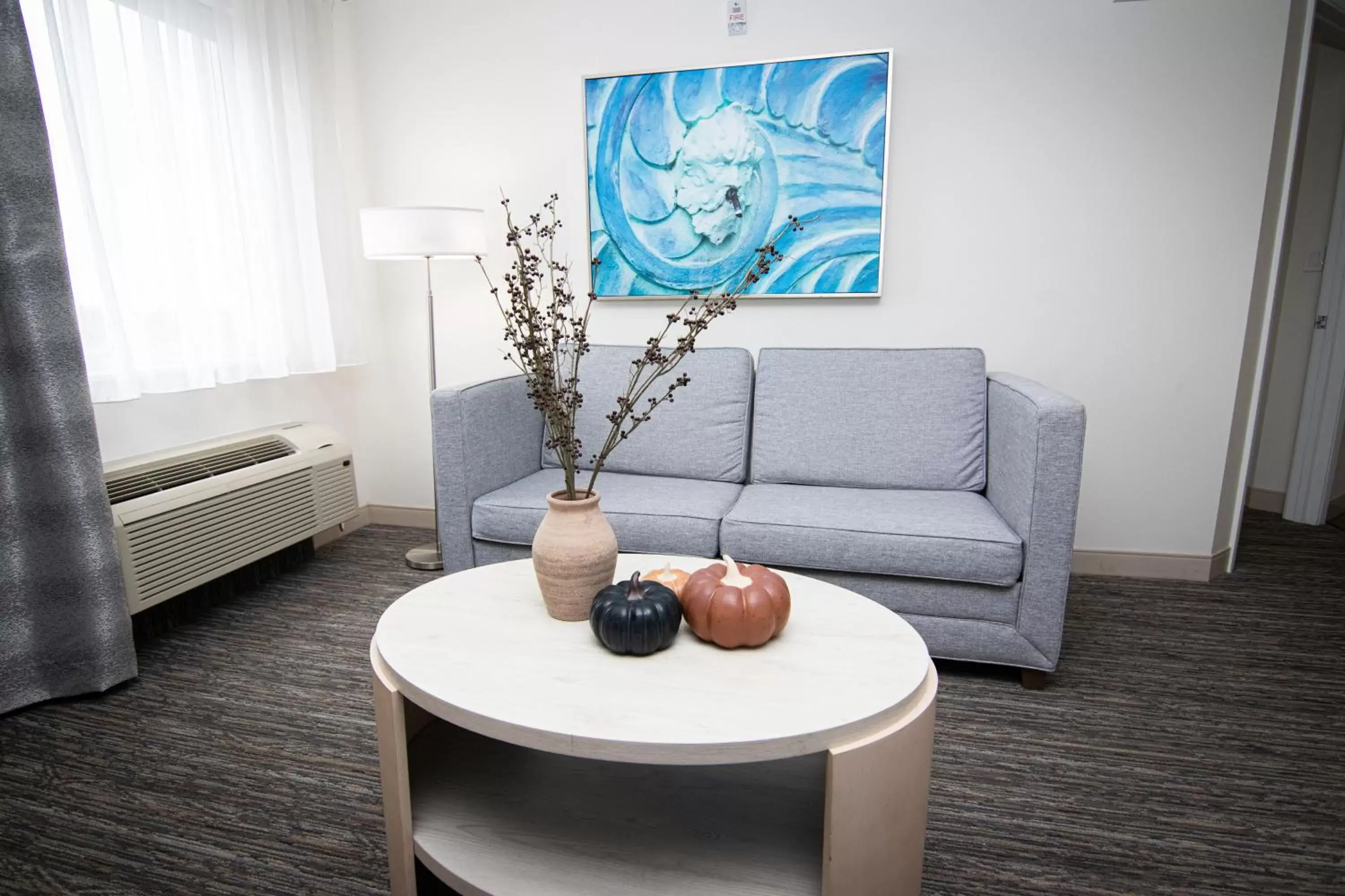 Living room, Seating Area in Candlewood Suites Miami Intl Airport - 36th St, an IHG Hotel