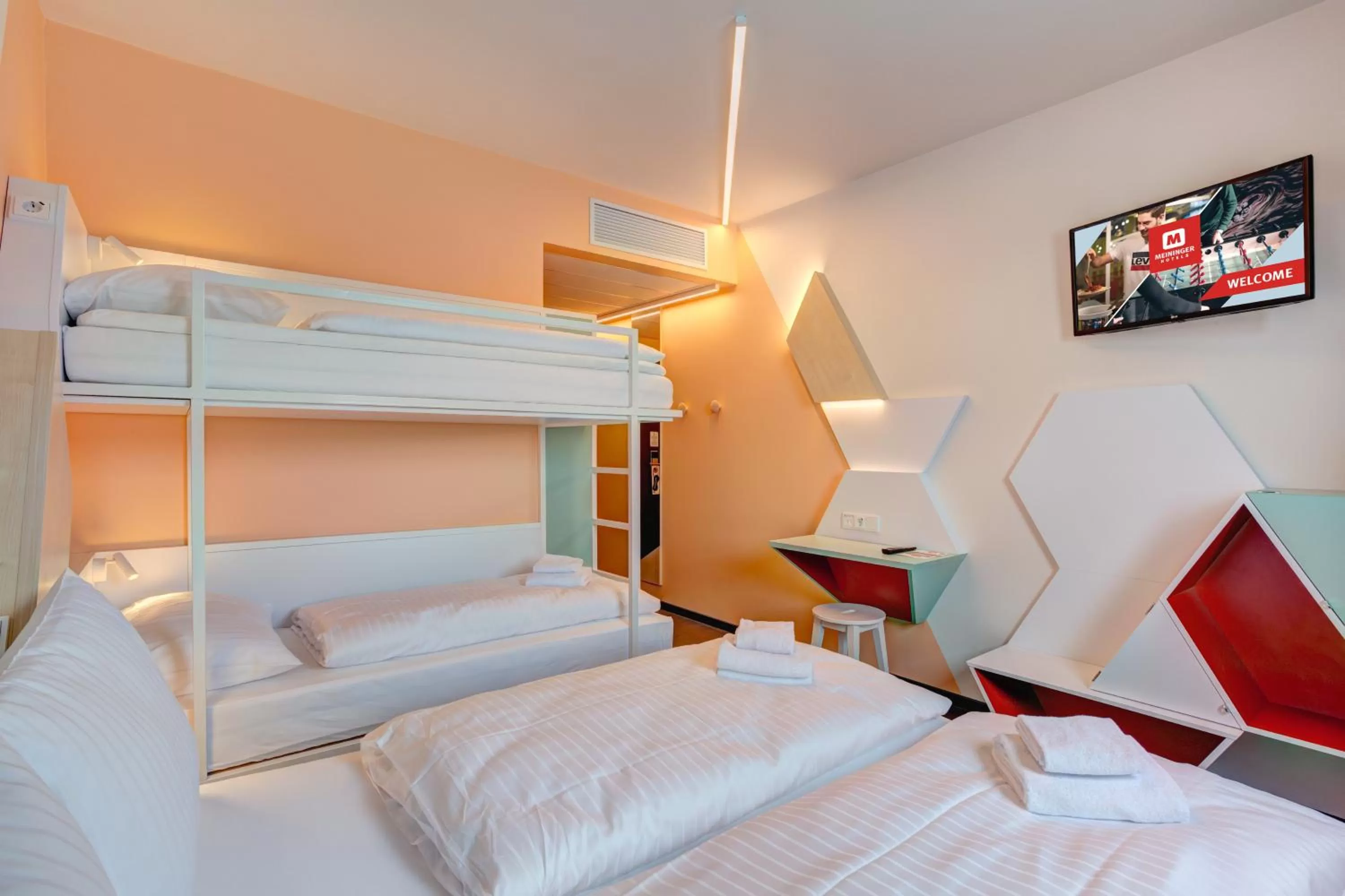 Photo of the whole room, Bed in MEININGER Hotel Heidelberg Hauptbahnhof