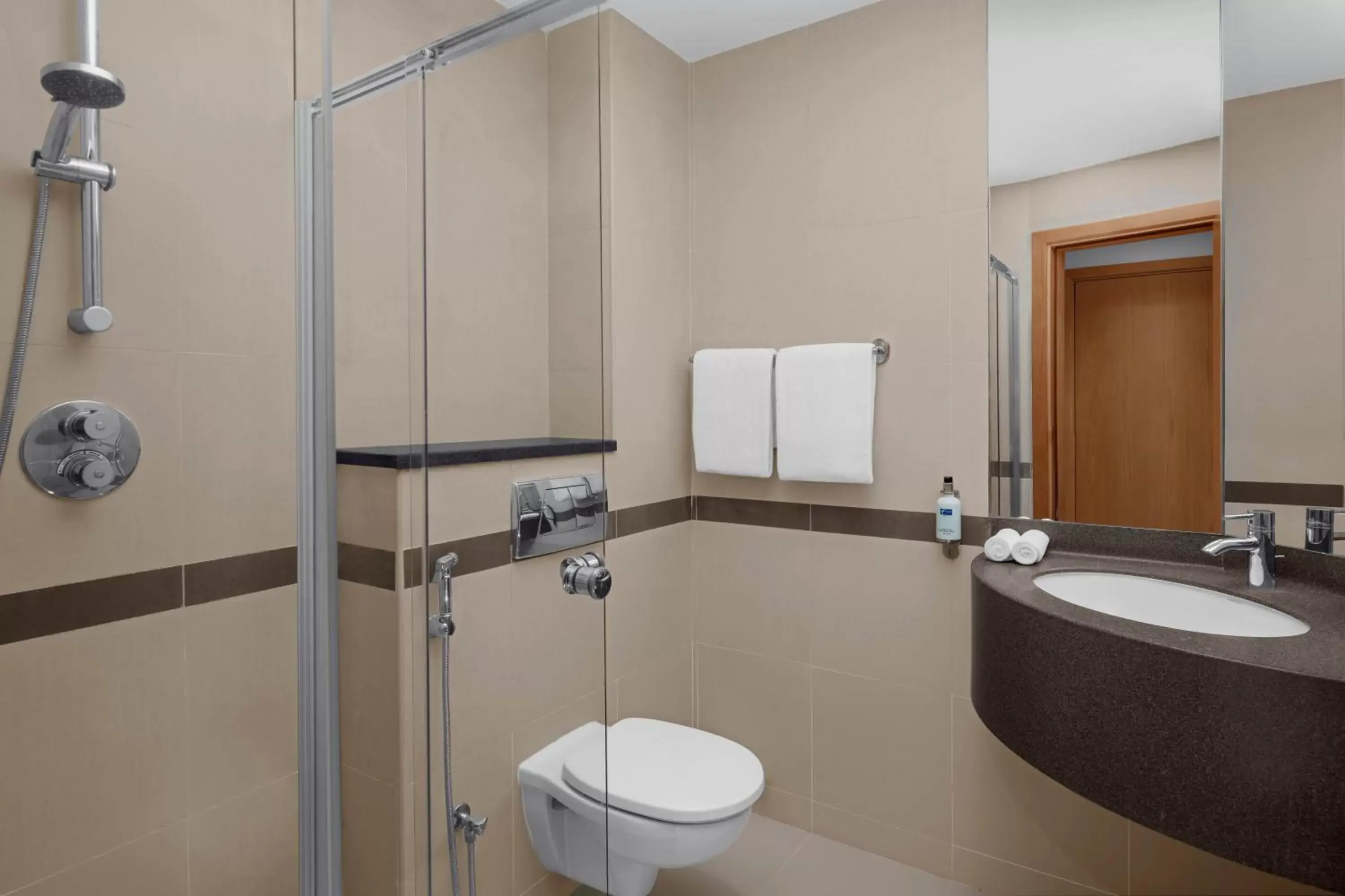 Bathroom in Holiday Inn Express Dubai Airport, an IHG Hotel