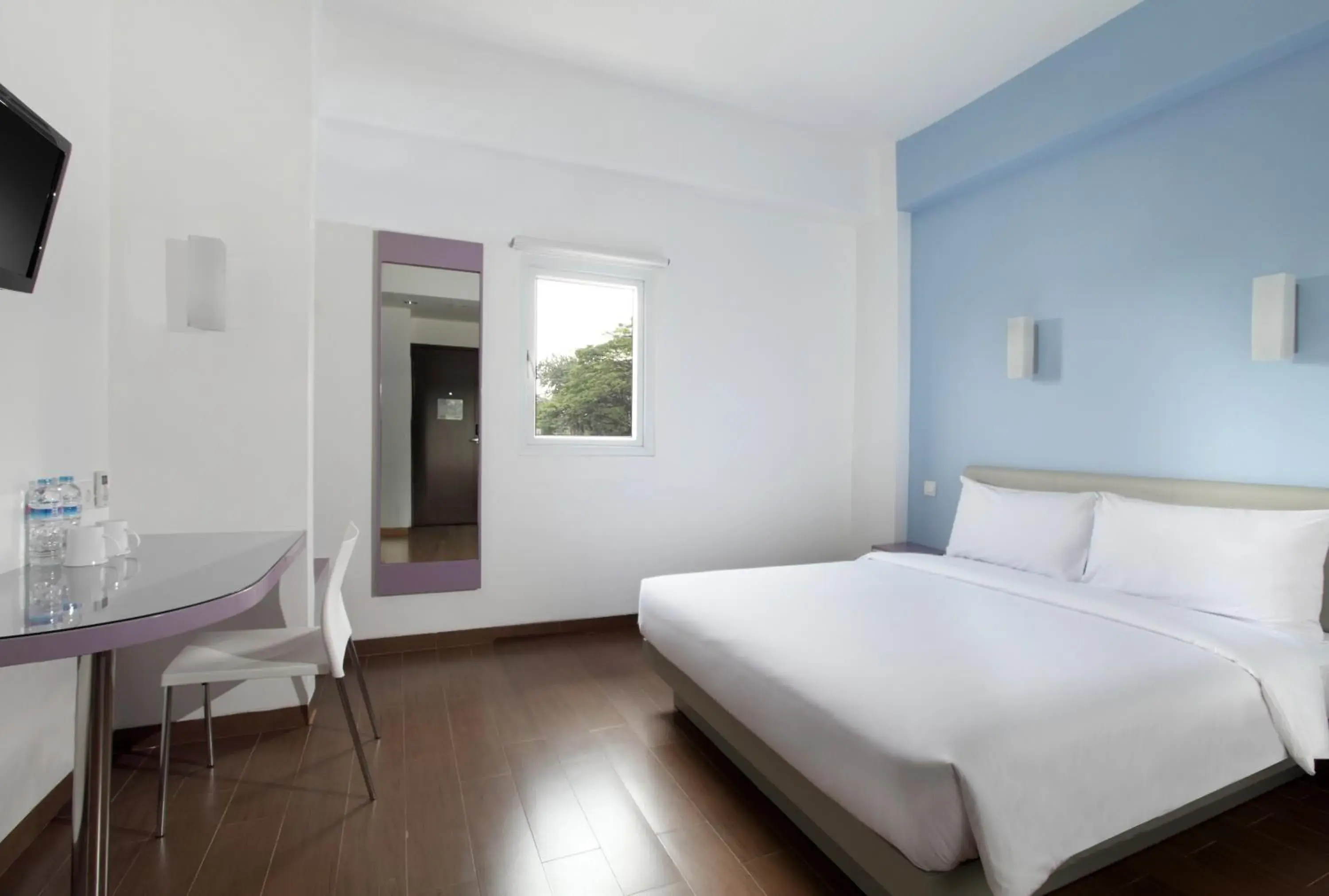 Bed in Amaris Hotel Cihampelas
