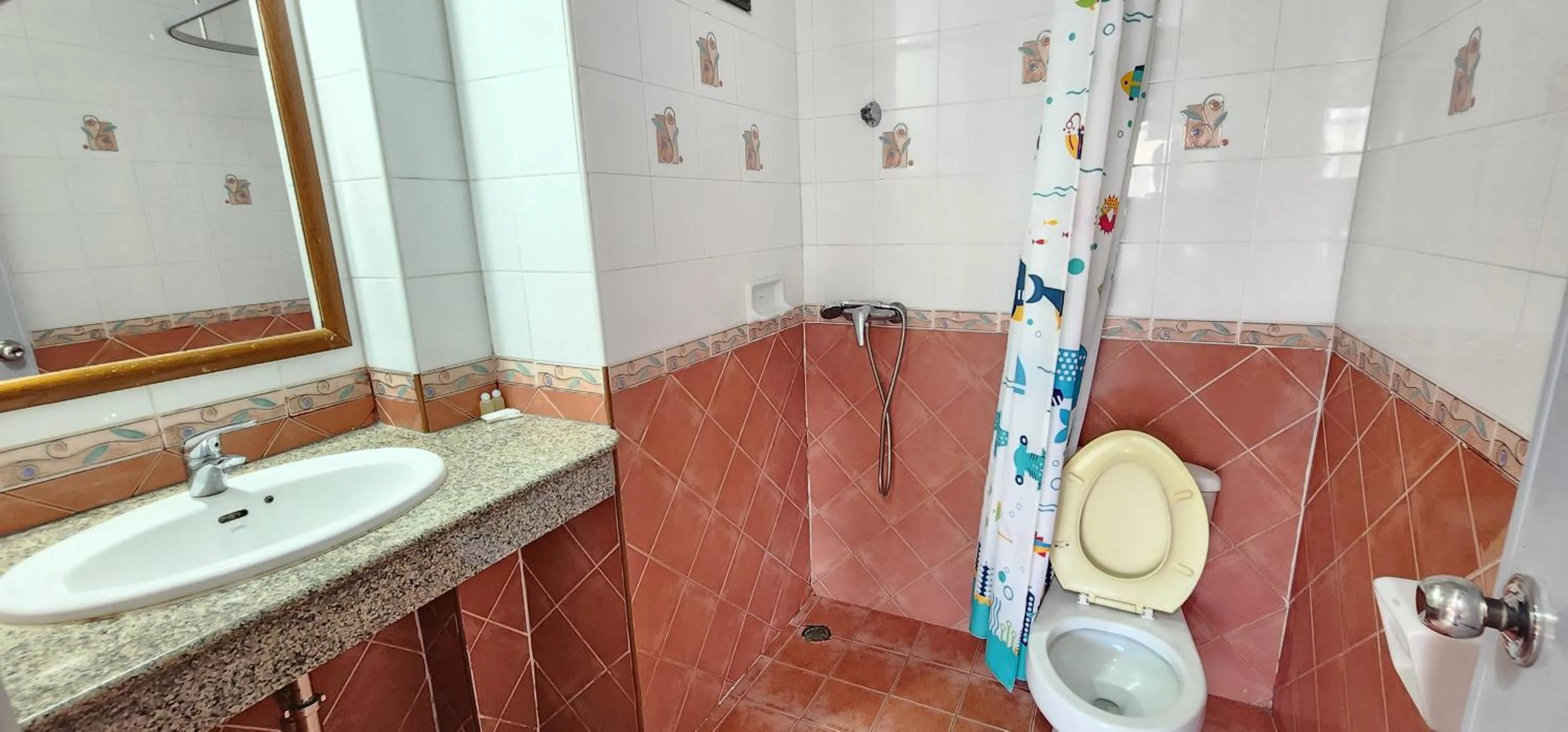 Bathroom in Royal Sweet Hotel