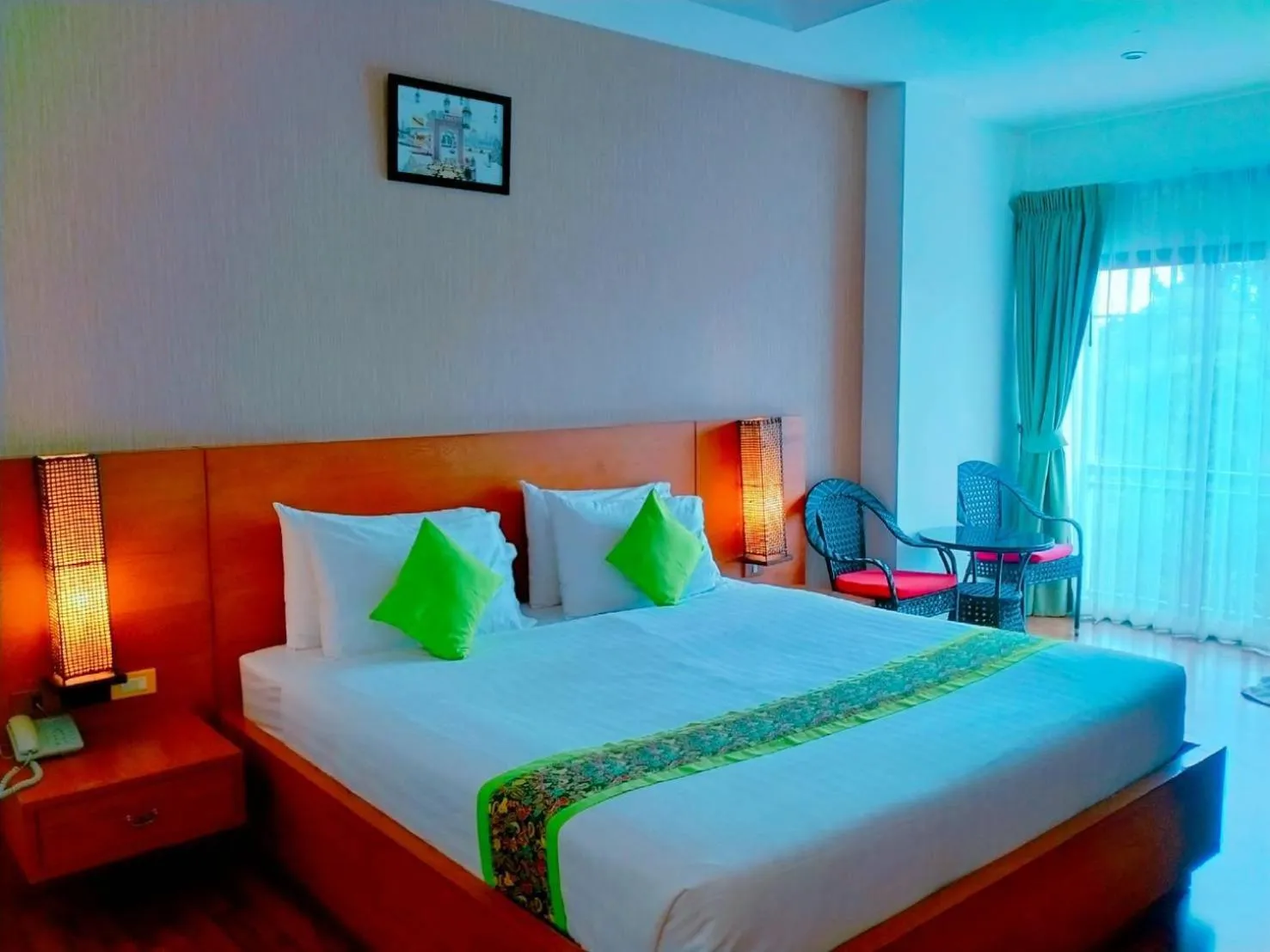 Bed in Jingjit Hotel