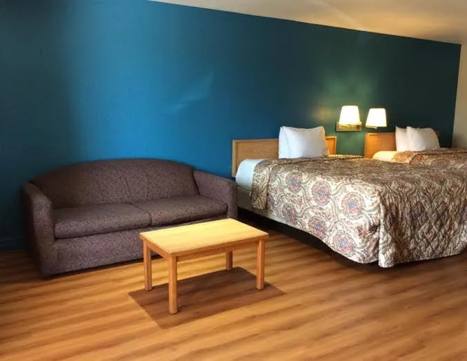 Bed in Stratford House Inn and Suites Temple