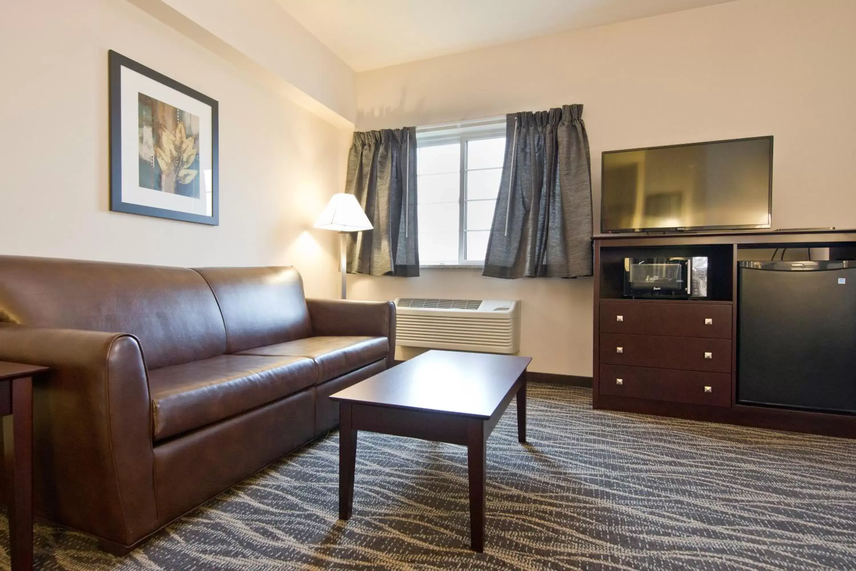 Bed, Seating Area in Cobblestone Inn & Suites - Boone