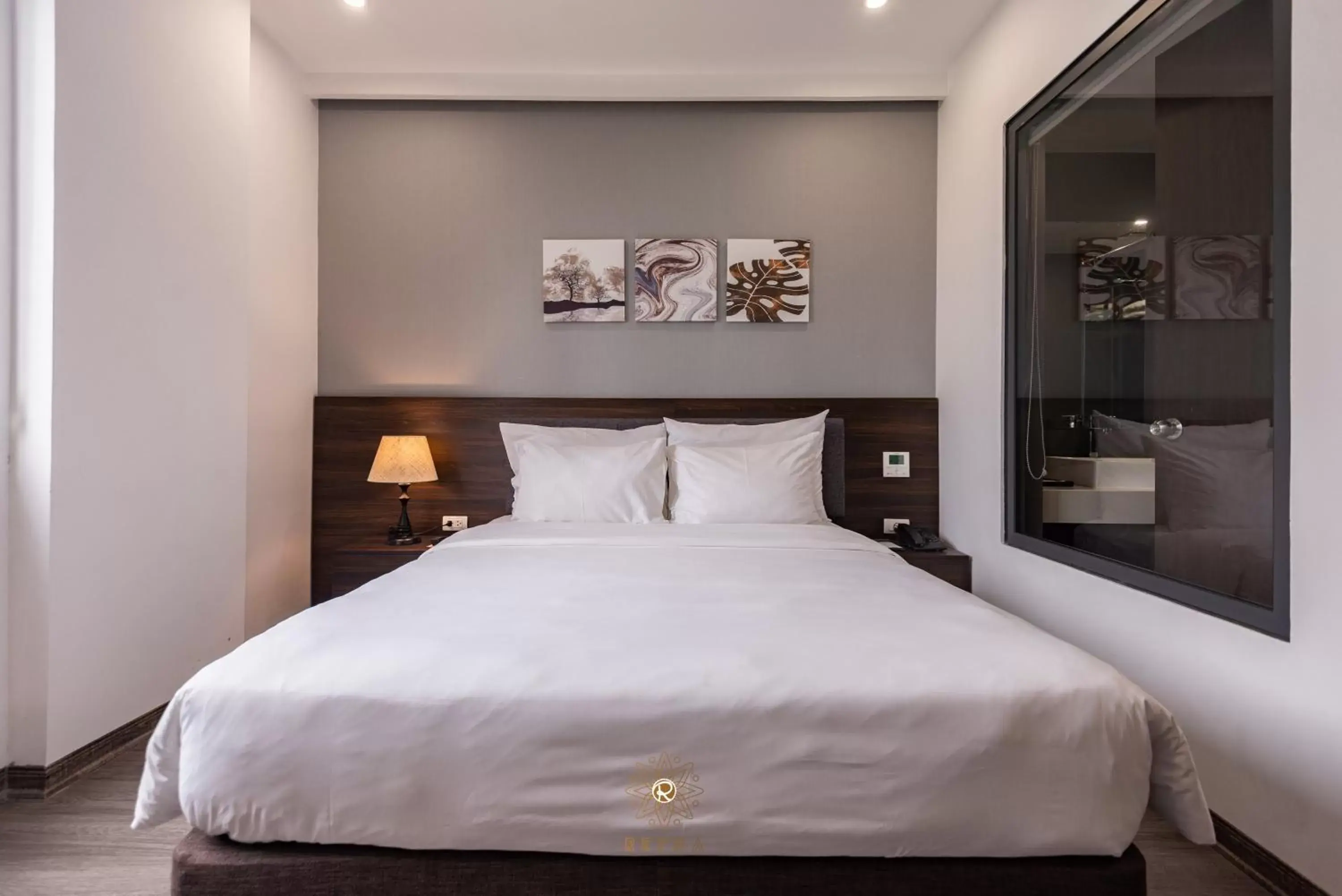 Bed in Reyna Hotel Hanoi & Spa Bed in Reyna Hotel Hanoi & Spa