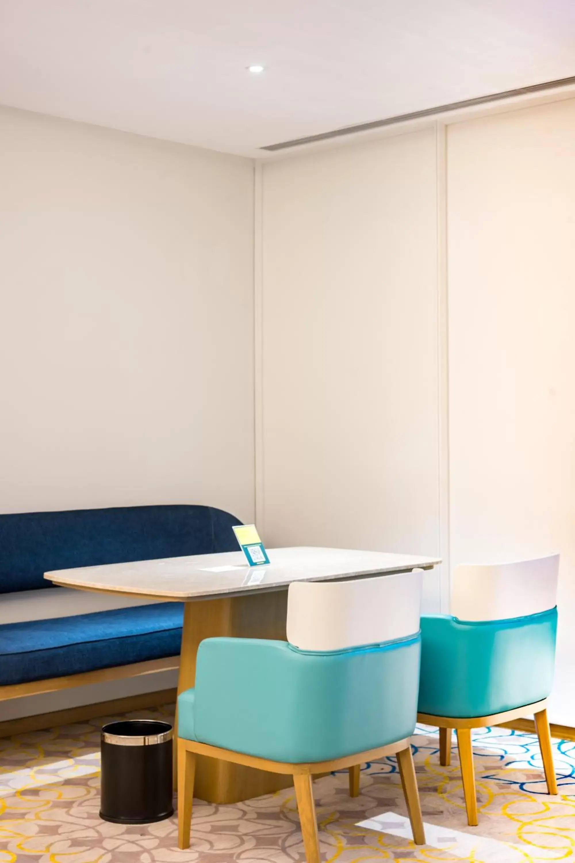 Living room in Holiday Inn Lucknow Airport by IHG Living room in Holiday Inn Lucknow Airport by IHG