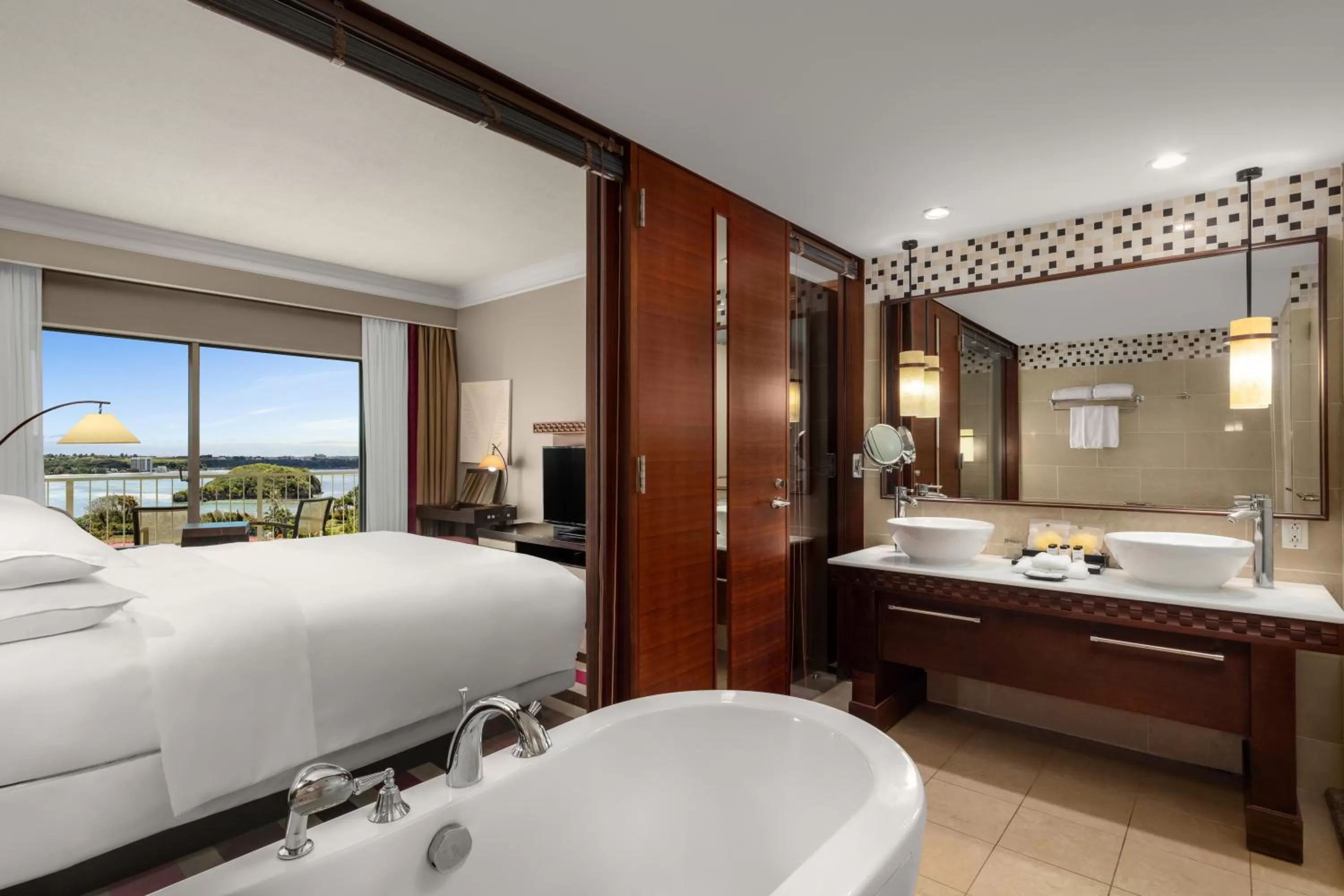 Bed in RIHGA Royal Laguna Guam Resort