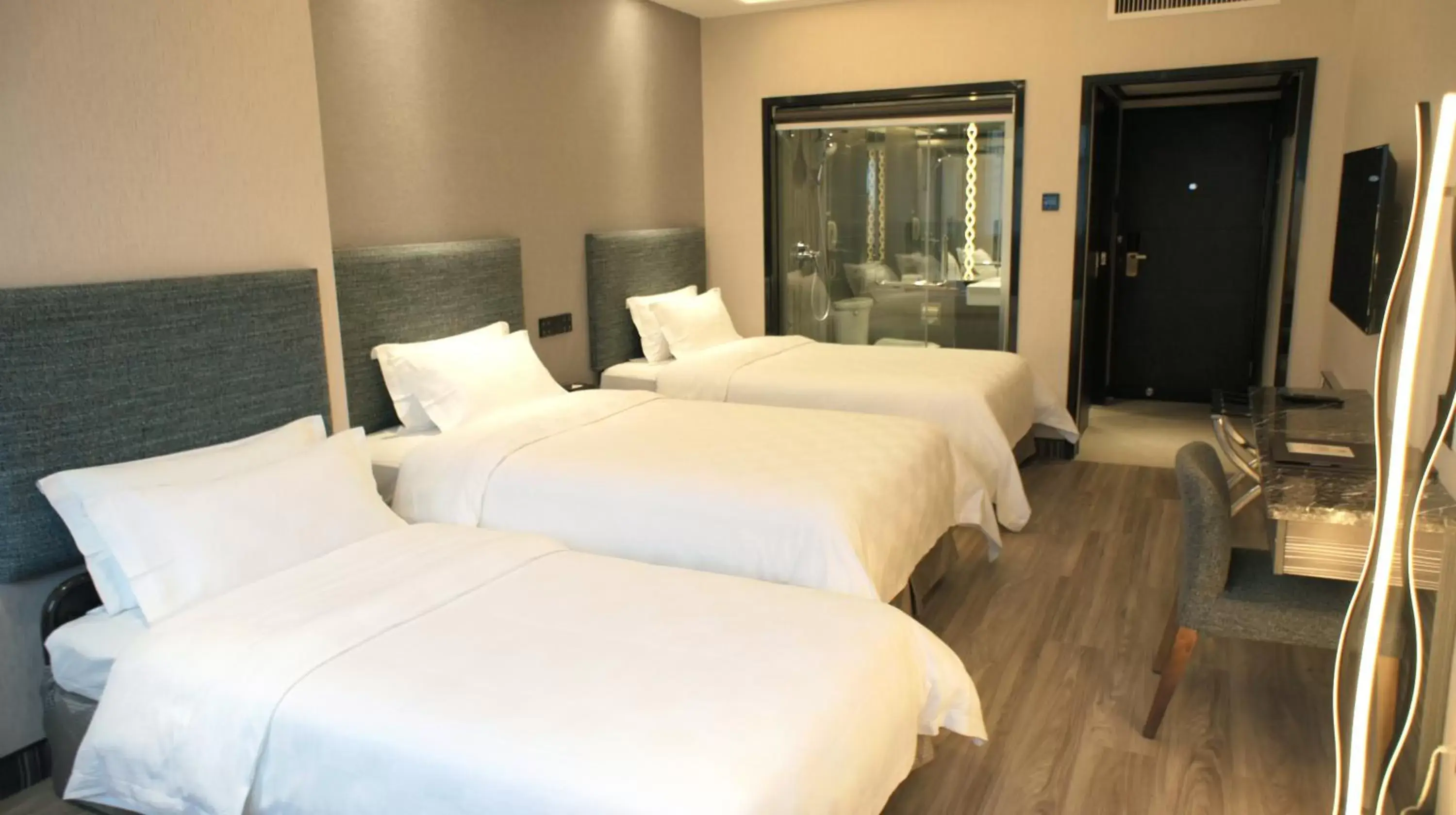 Bed in Shenzhen Lido Hotel