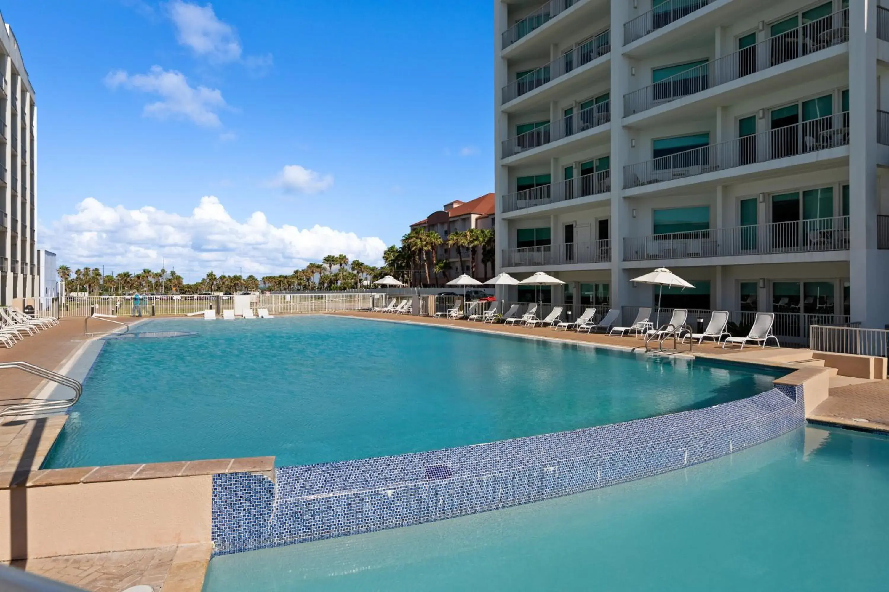 Swimming pool in Peninsula Island Resort & Spa - Beachfront Property at South Padre Island Swimming pool in Peninsula Island Resort & Spa - Beachfront Property at South Padre Island