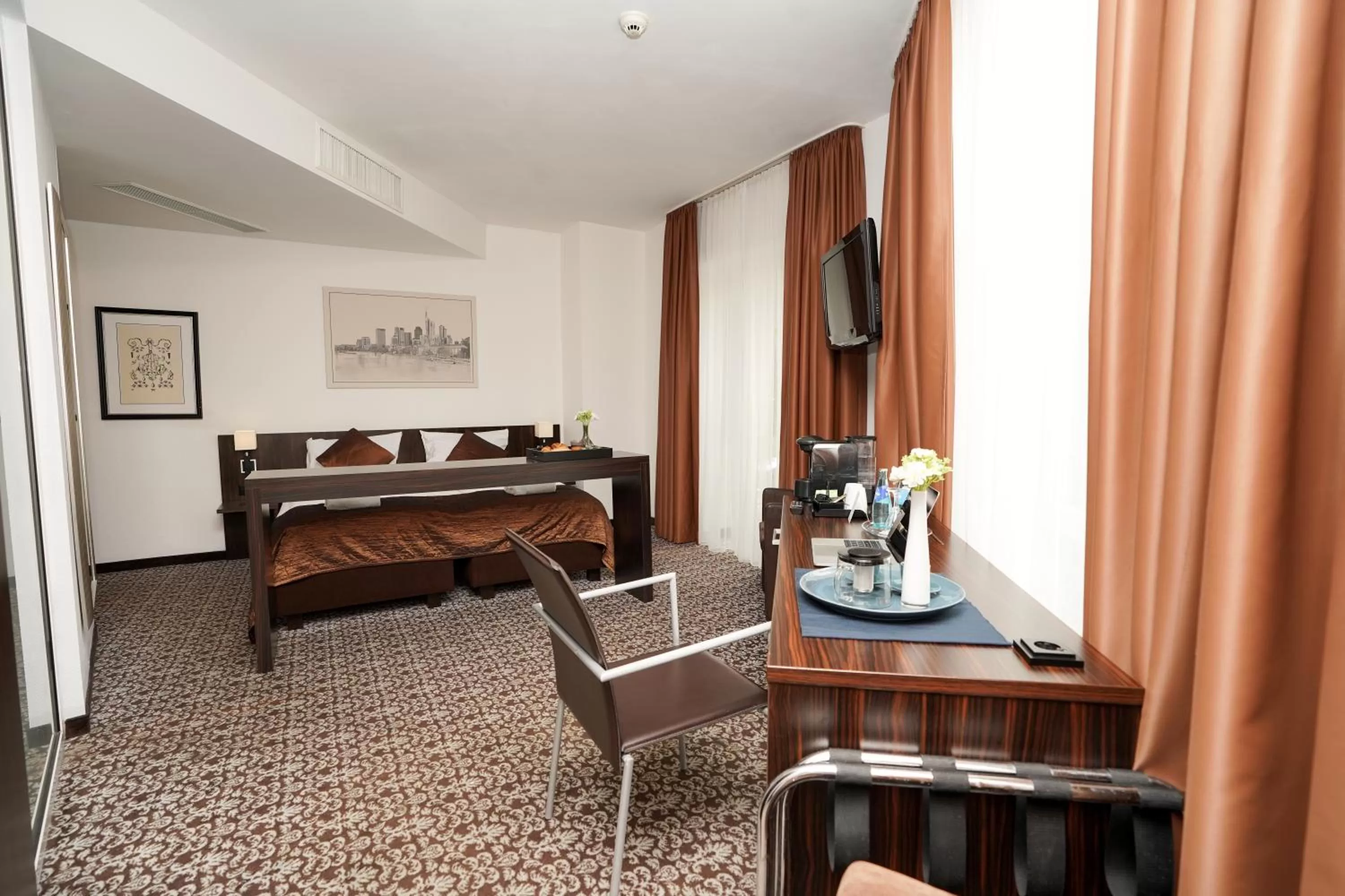 Bed in The Atrium Hotel