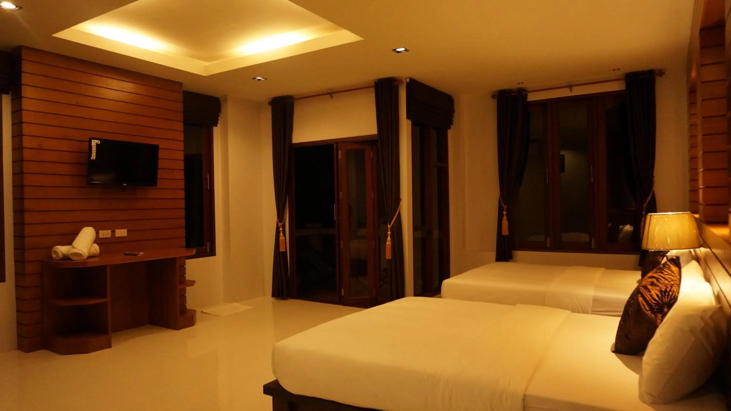Photo of the whole room, Bed in Lanta Intanin Resort - SHA Extra Plus