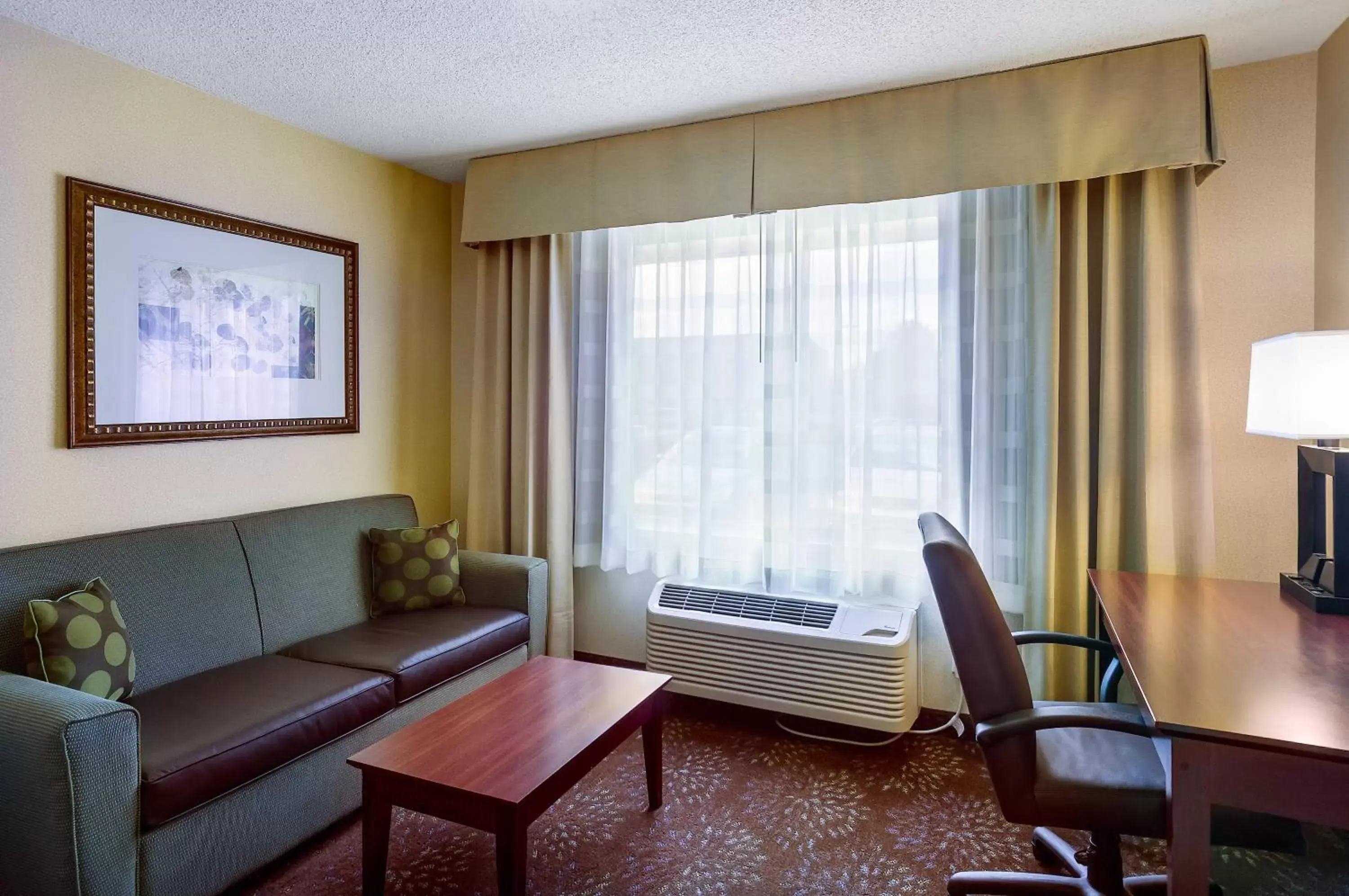 Bedroom, Seating Area in Holiday Inn Express & Suites Sandy - South Salt Lake City, an IHG Hotel